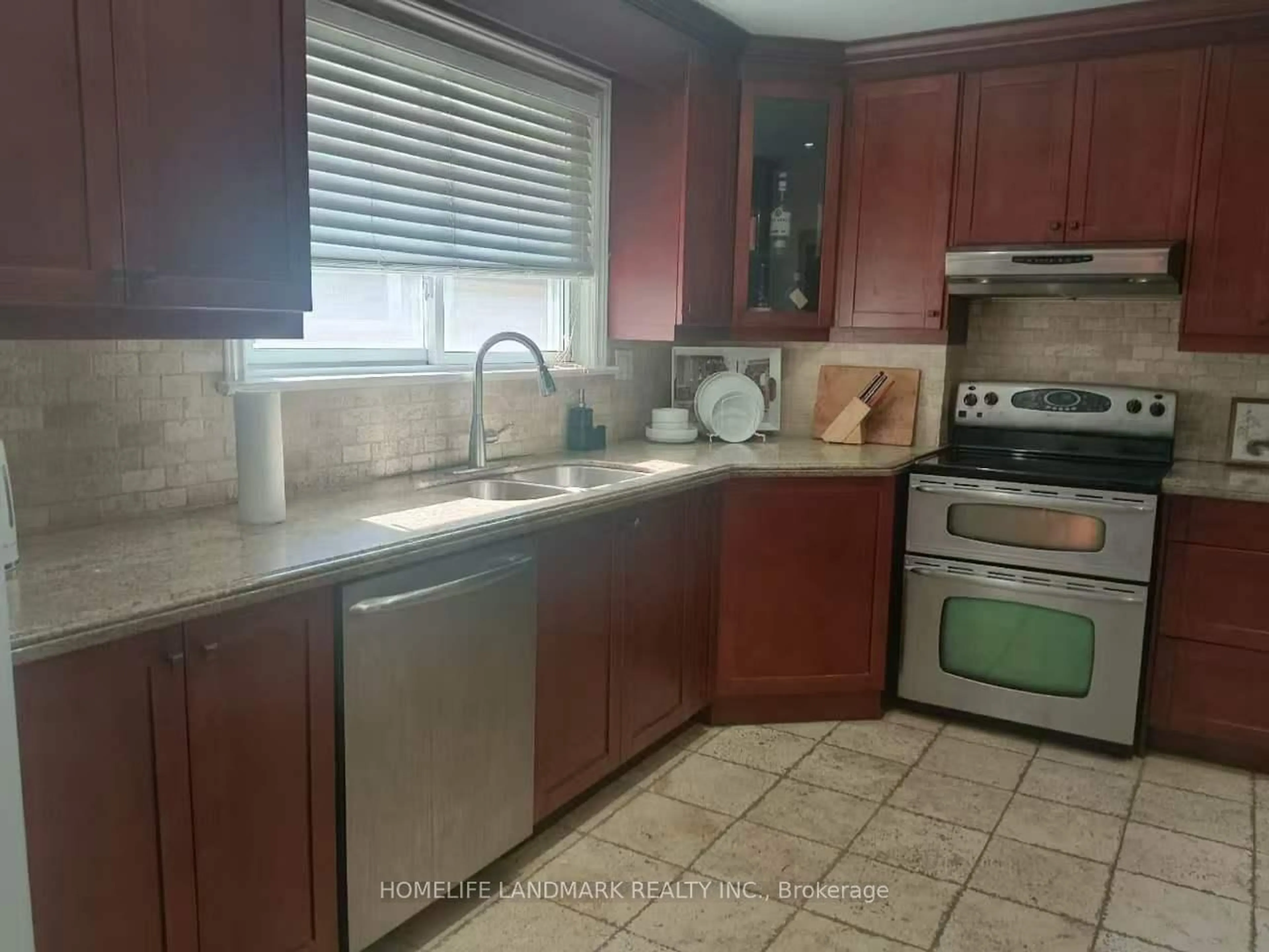 Standard kitchen, ceramic/tile floor for 40 Carsbrooke Rd, Toronto Ontario M9C 3C1