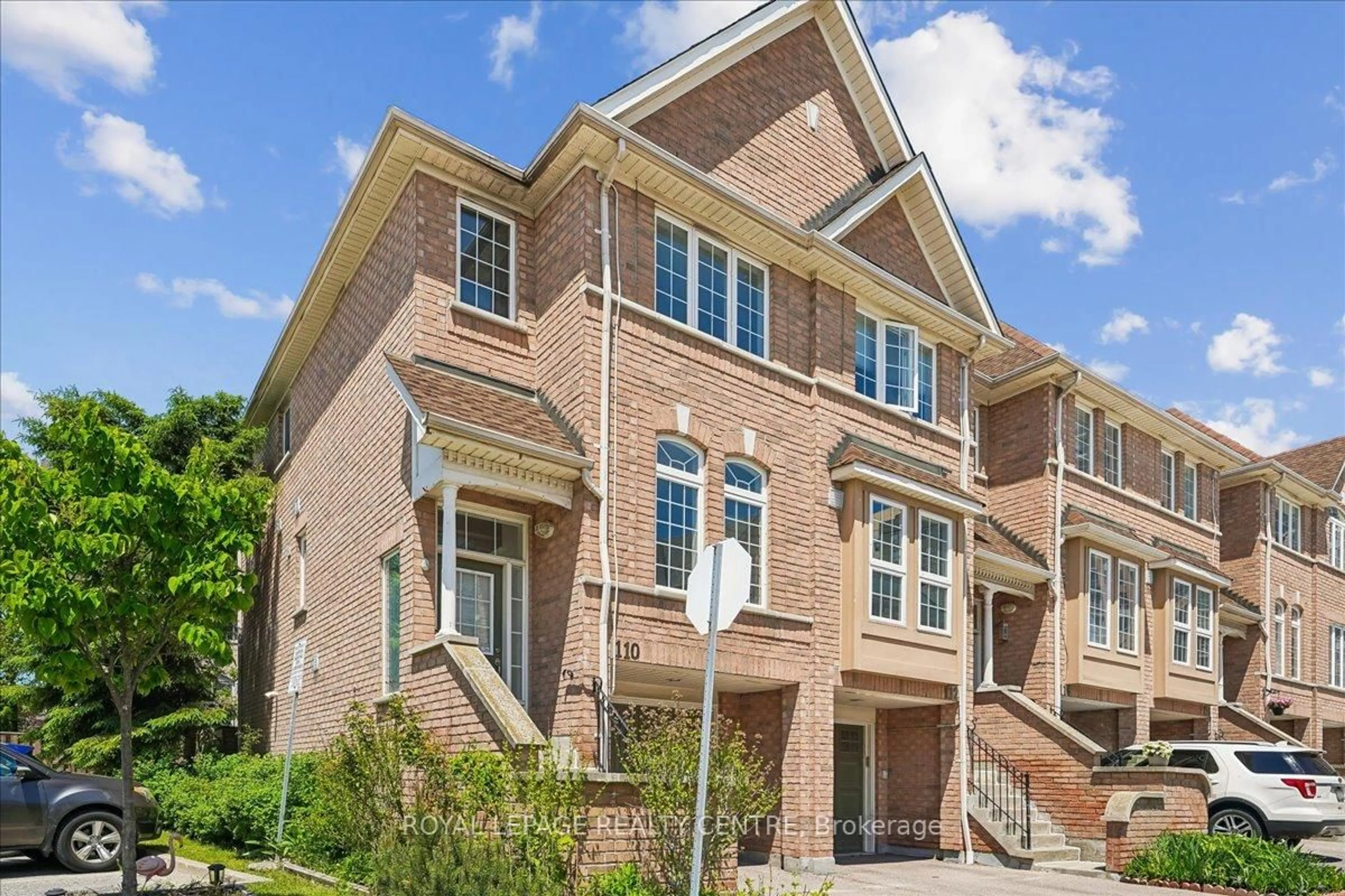 Home with brick exterior material, street for 50 Strathaven Dr #110, Mississauga Ontario L5R 4E7