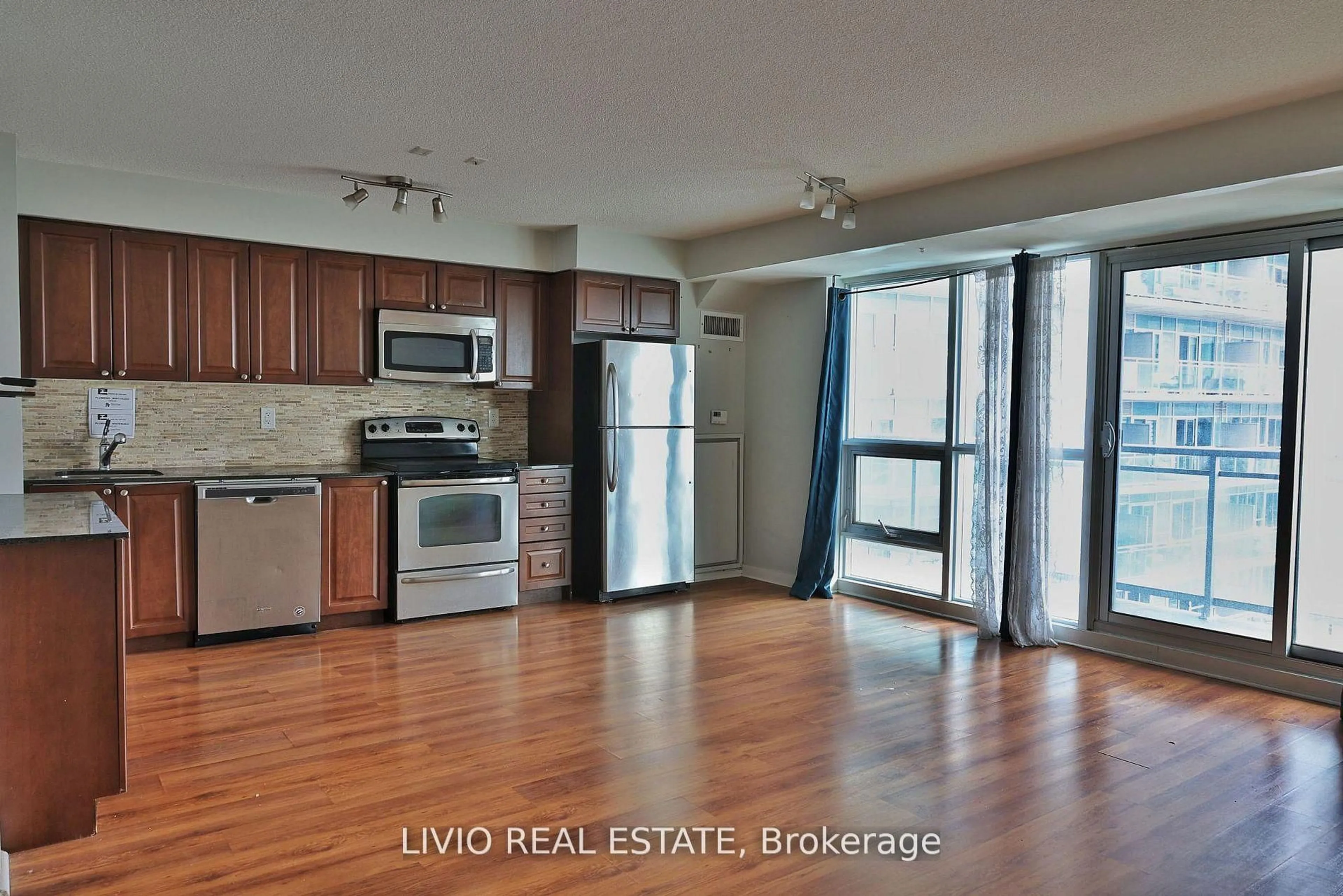 Open concept kitchen, wood/laminate floor for 155 Legion Rd #2101, Toronto Ontario M8Y 0A7