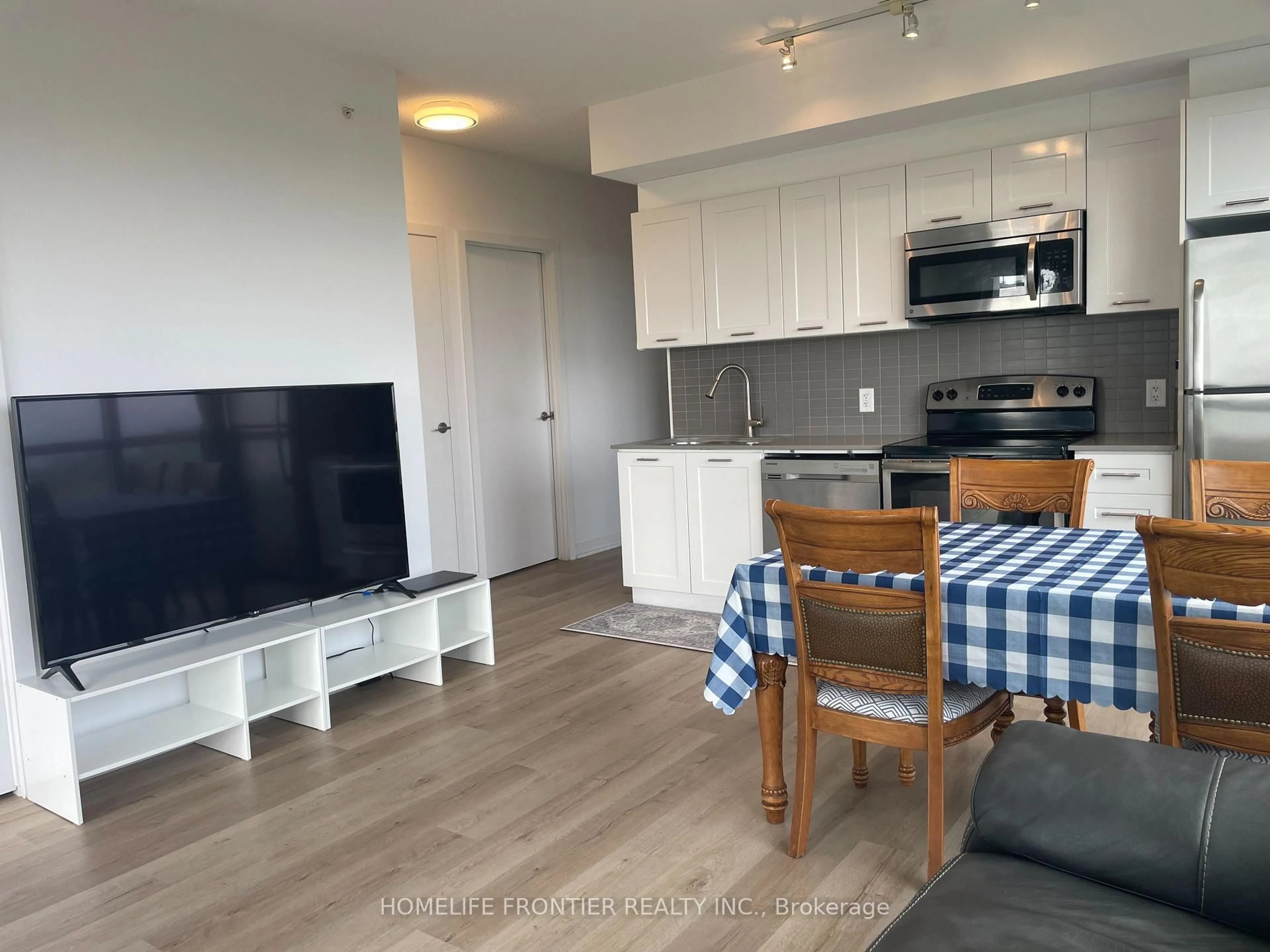 Open concept kitchen, wood/laminate floor for 2200 Lakeshore Blvd #1001, Toronto Ontario M8V 1A4