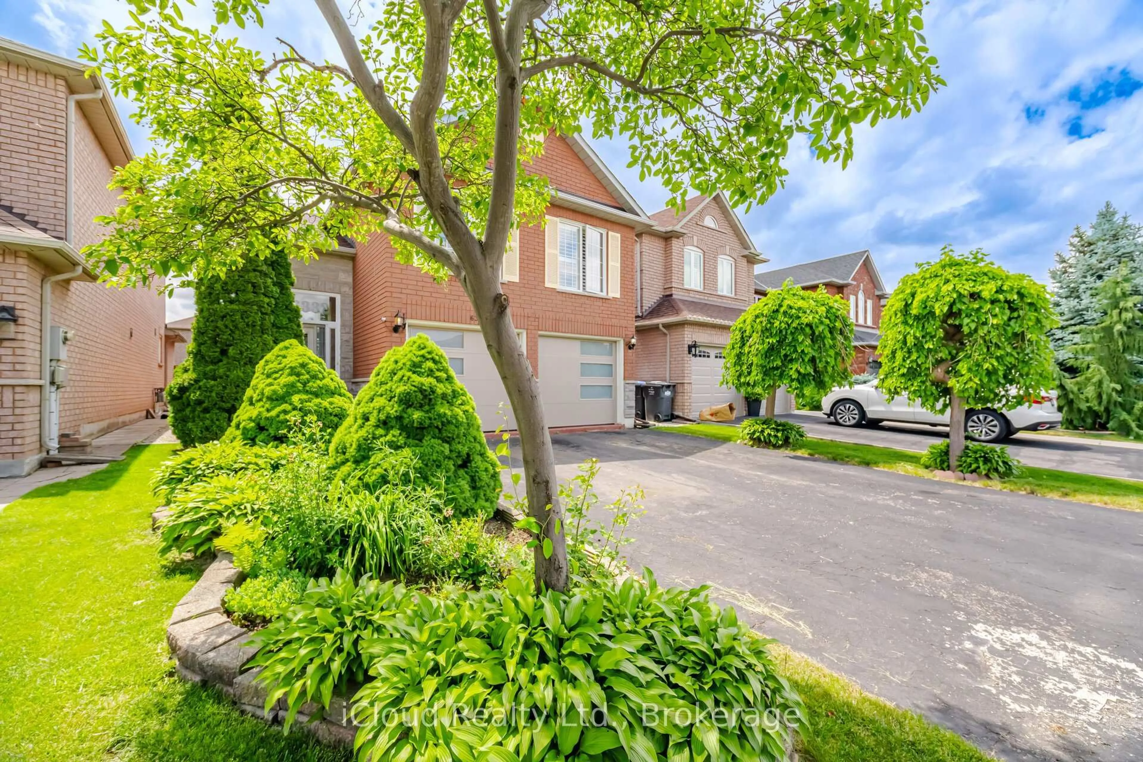 Home with brick exterior material, street for 6332 Glen Meadows Rd, Mississauga Ontario L5N 7W3