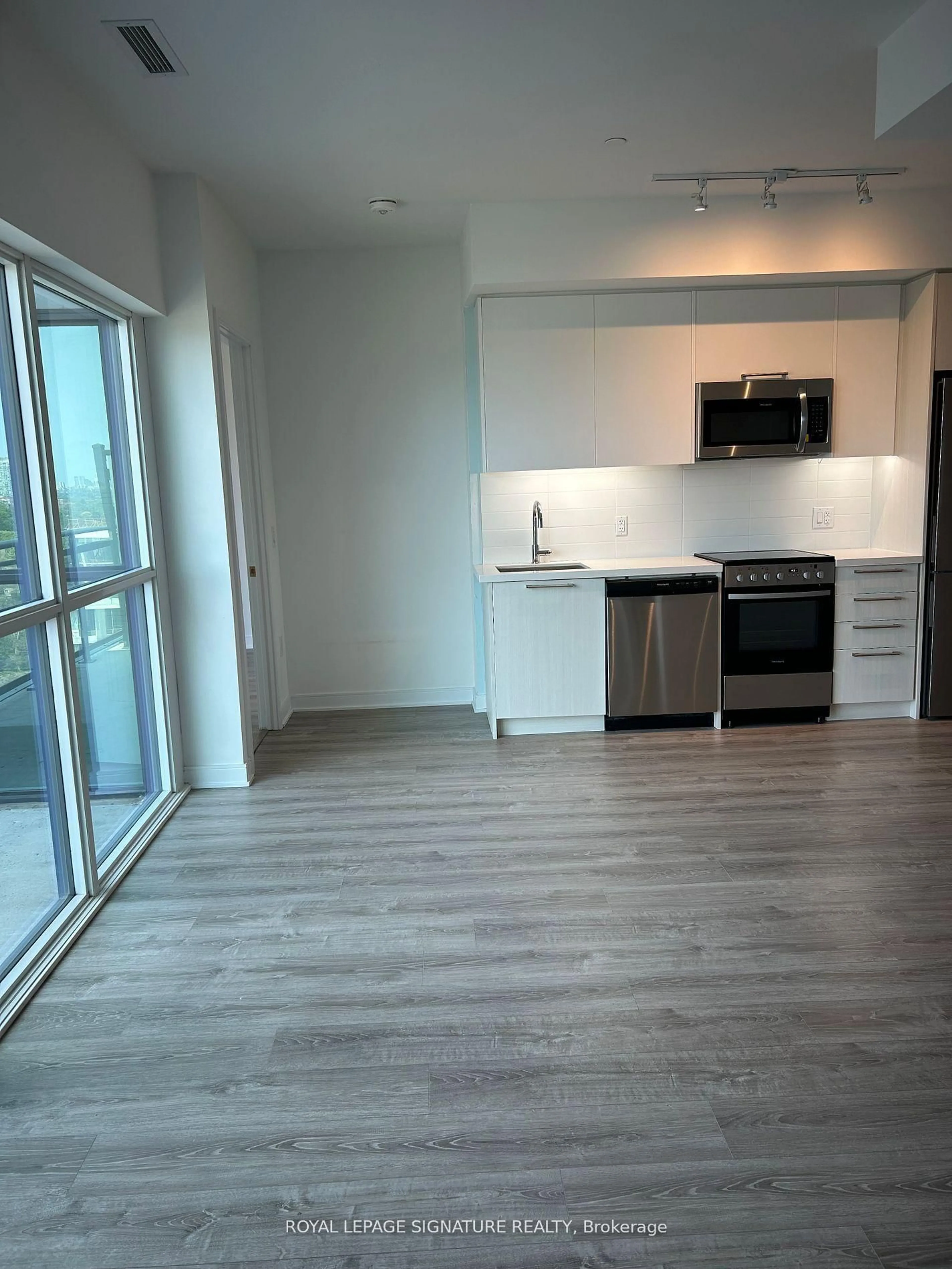 Open concept kitchen, unknown for 25 Neighbourhood Lane #1012, Toronto Ontario M8Y 0C4