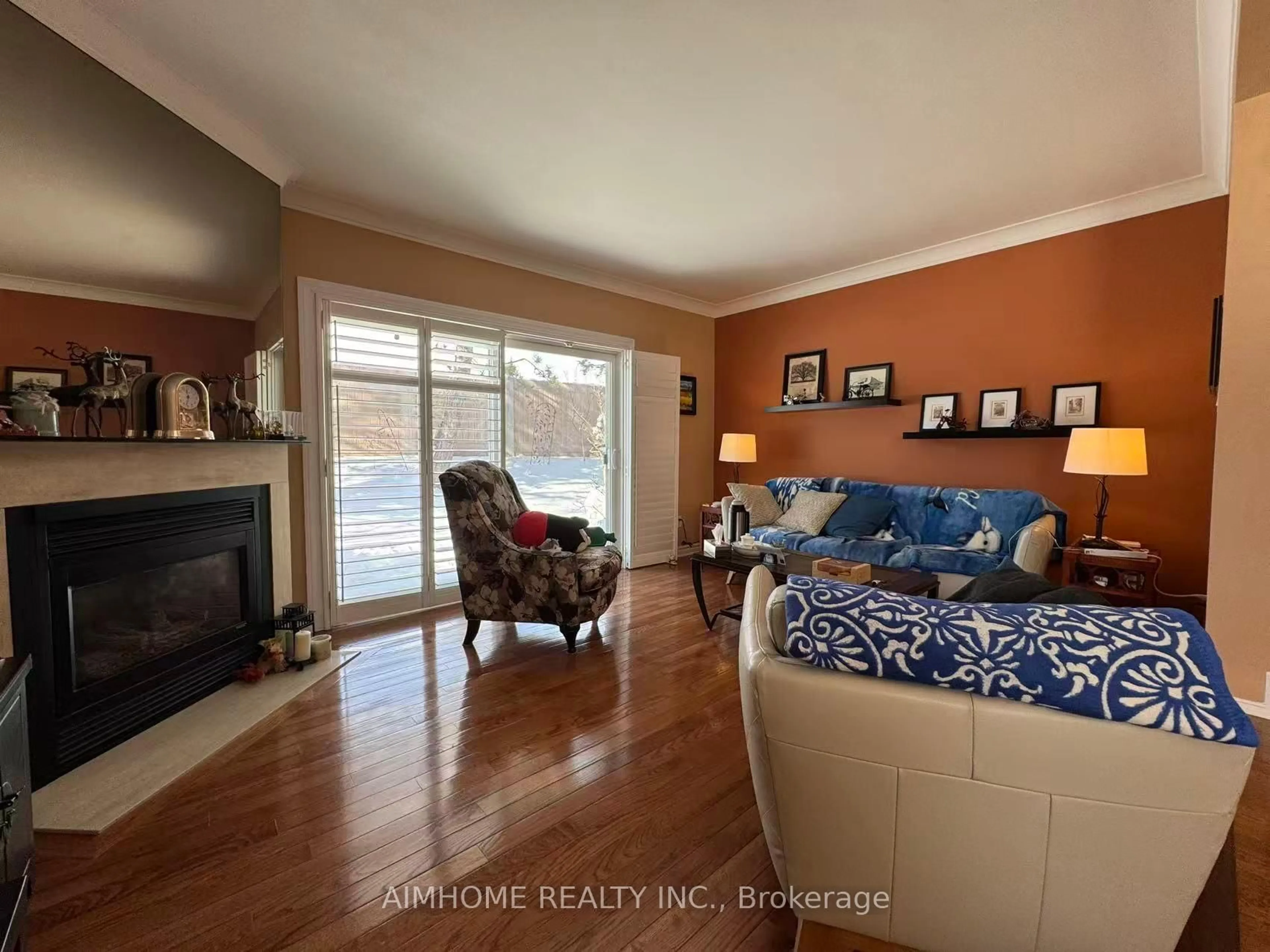 Living room with furniture, wood/laminate floor for 2205 South Millway Way #60, Mississauga Ontario L5L 3T2