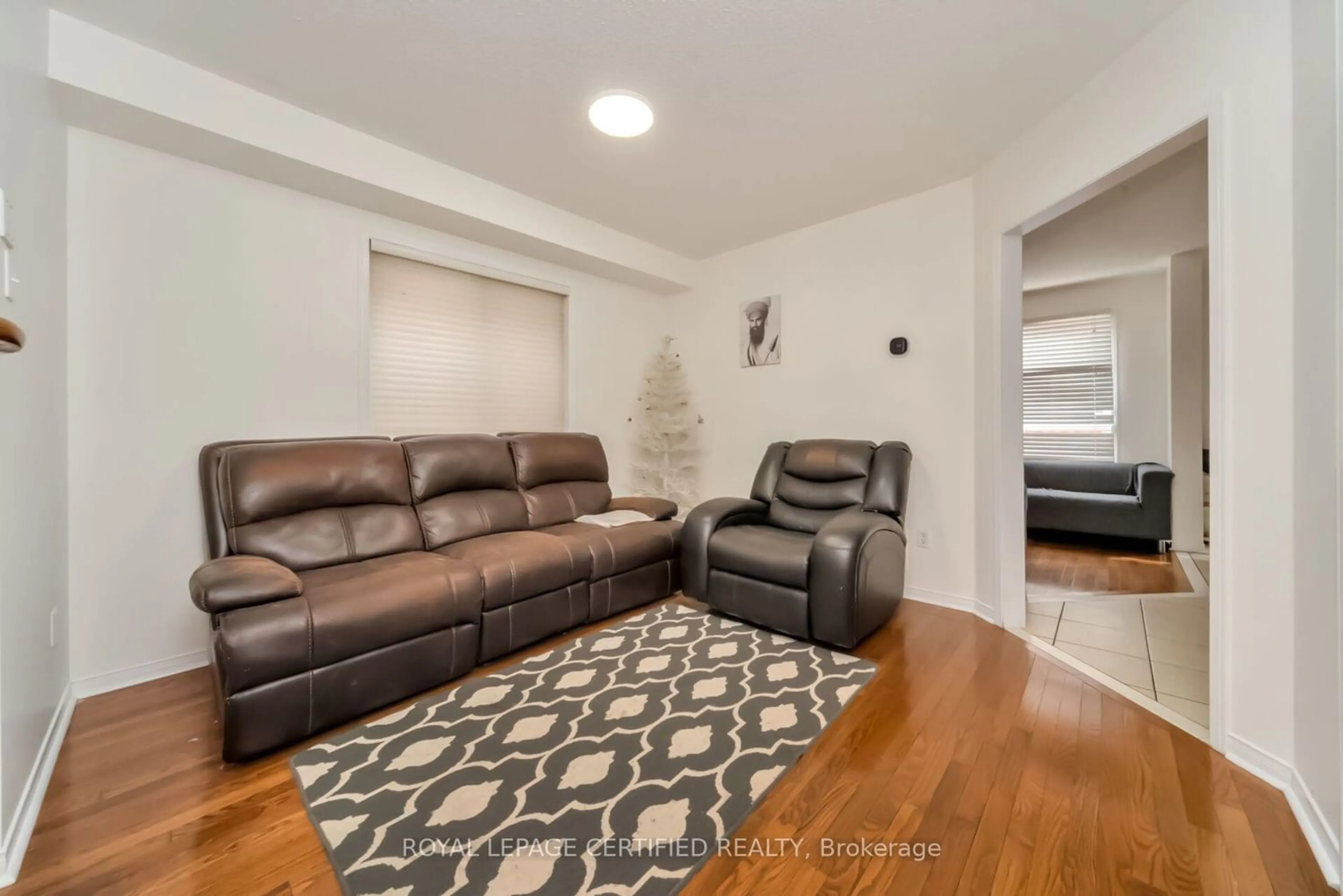 Living room with furniture, unknown for 42 Trumpet Valley Blvd, Brampton Ontario L7A 3N8