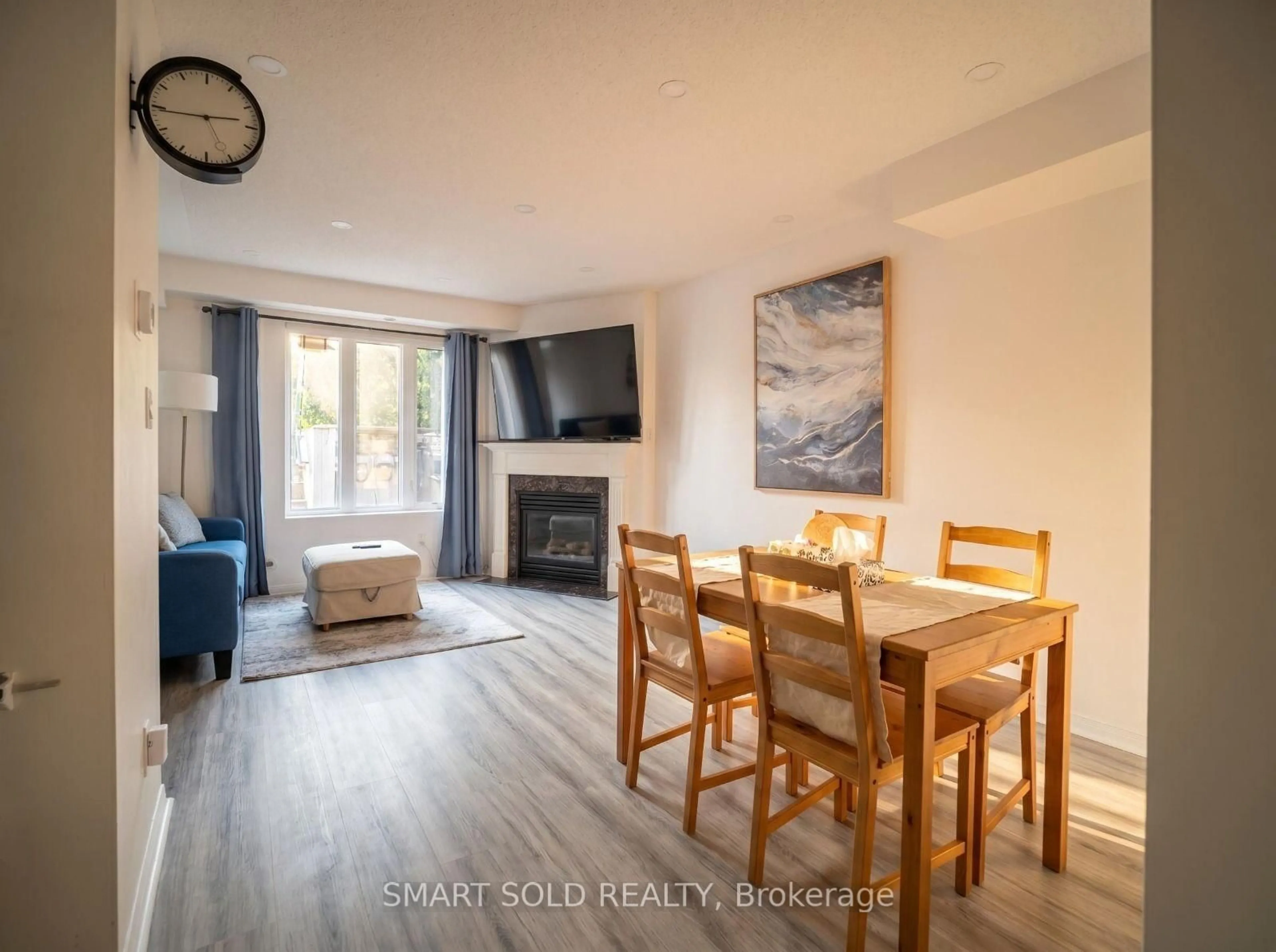 Living room with furniture, wood/laminate floor for 15 Laidlaw St #608, Toronto Ontario M6K 1X3