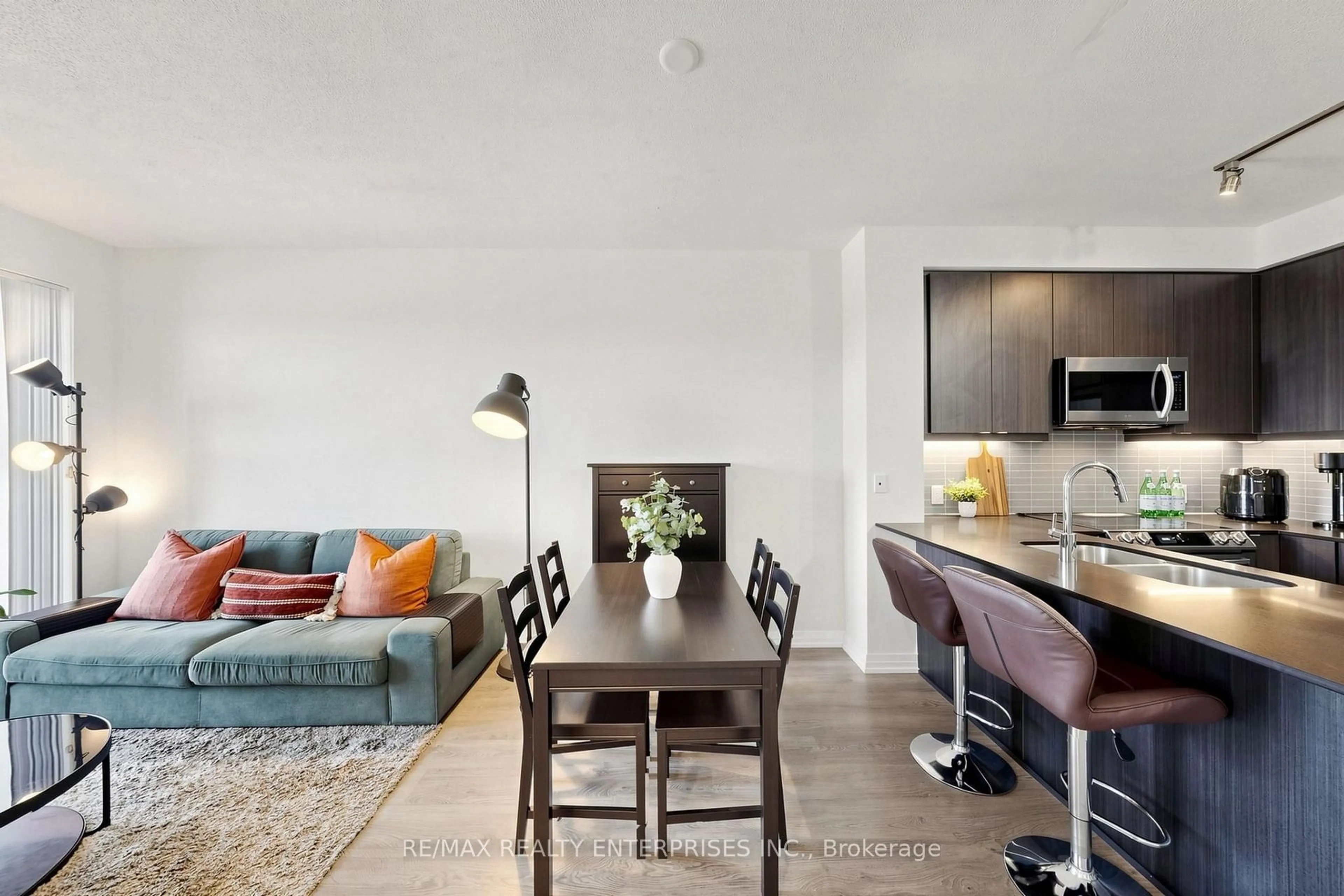 Living room with furniture, unknown for 50 Thomas Riley Rd #712, Toronto Ontario M9B 0C3