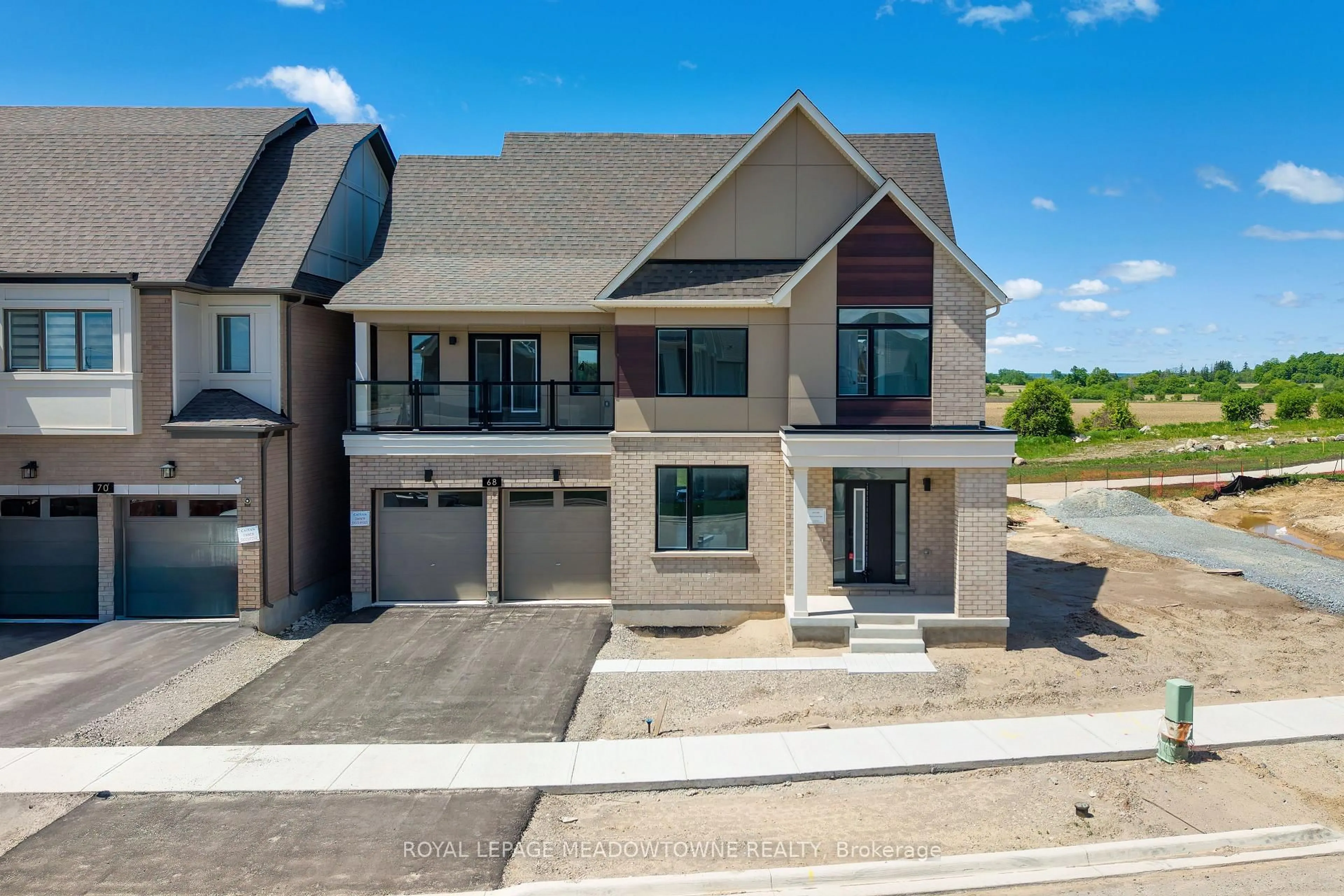 Home with brick exterior material, street for 68 Spiritwood Way, Brampton Ontario L7A 5L9
