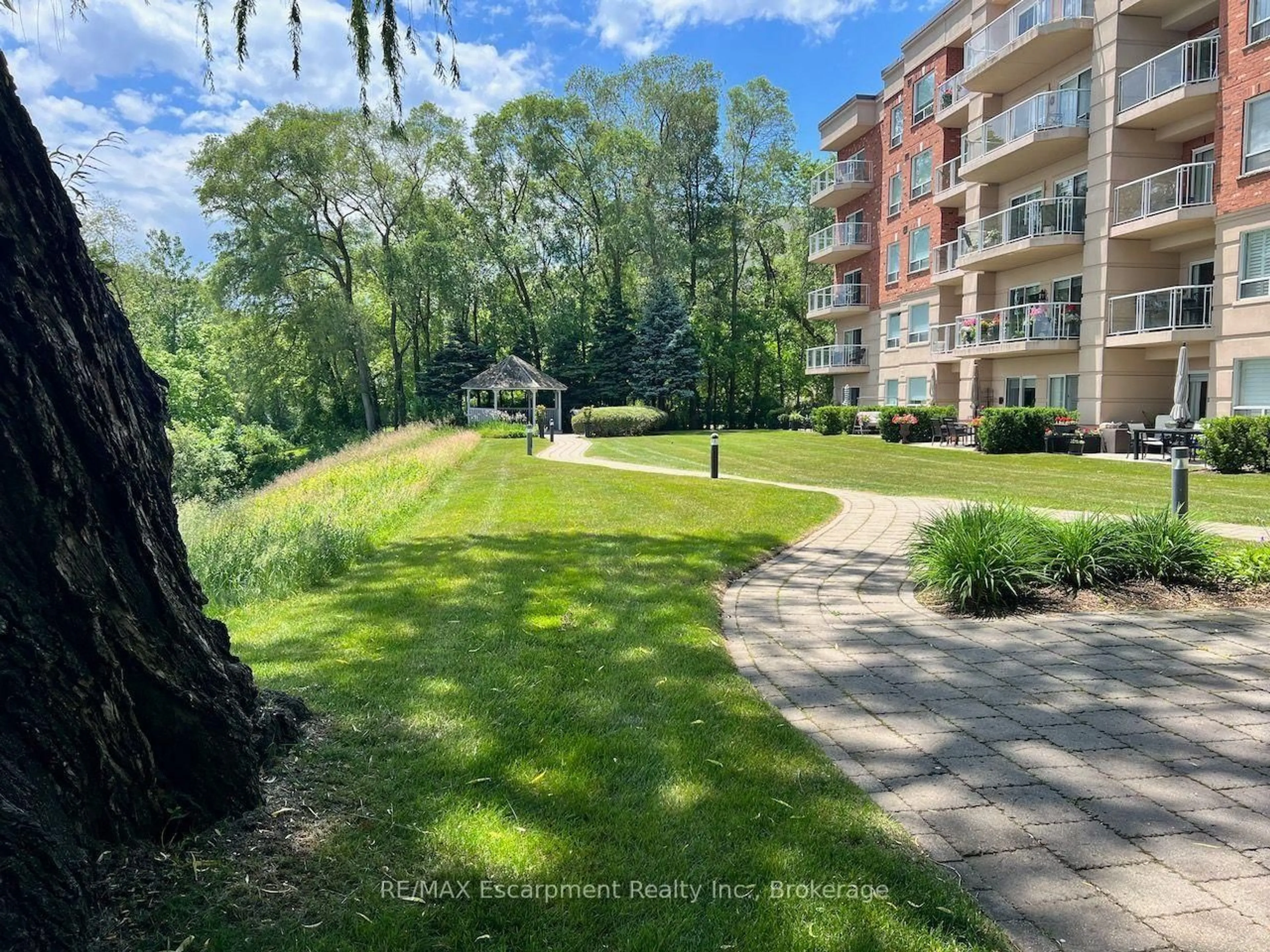 A pic from outside/outdoor area/front of a property/back of a property/a pic from drone, water/lake/river/ocean view for 5188 Lakeshore Rd #310, Burlington Ontario L7L 6P4