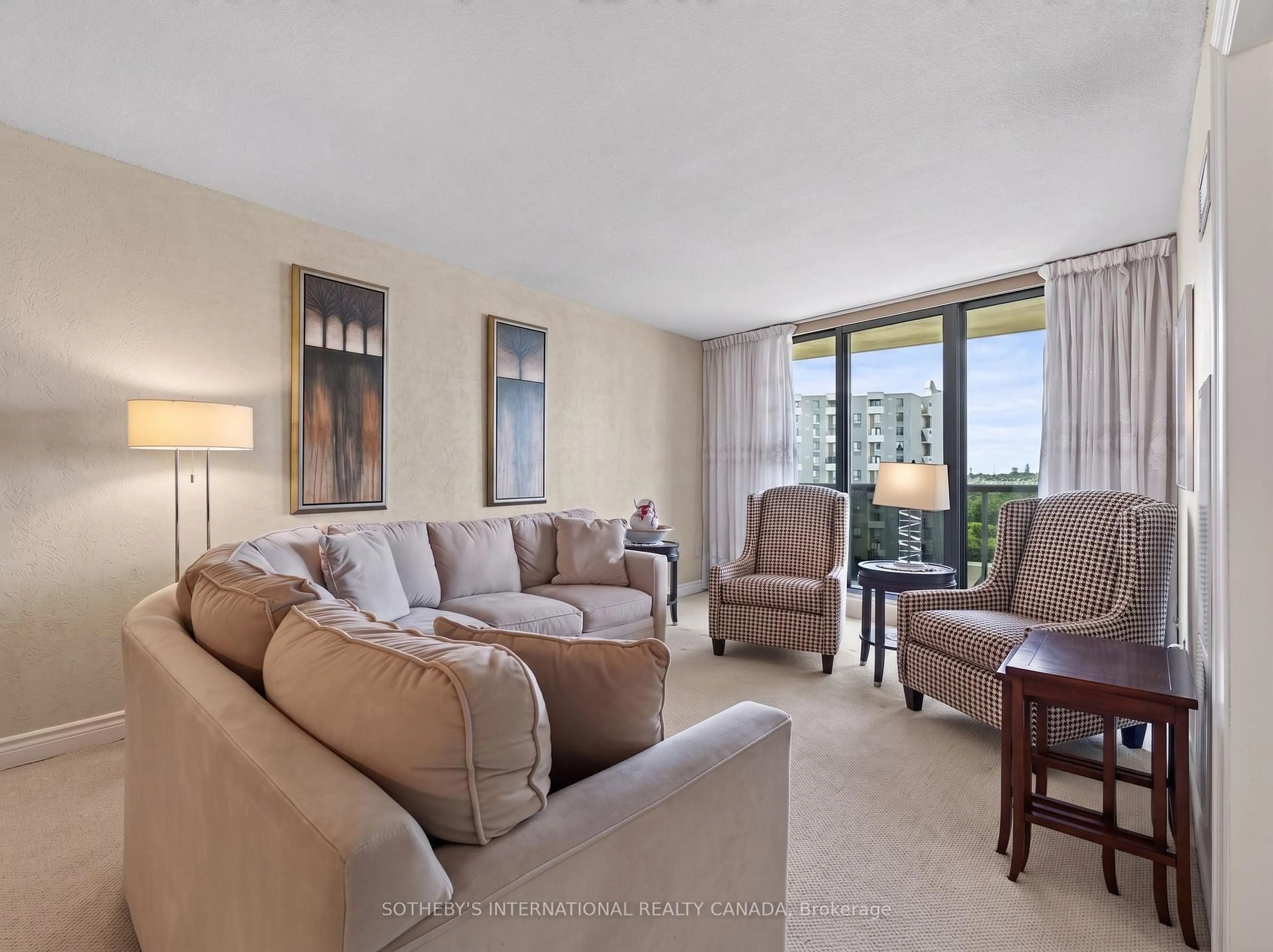 Living room with furniture, unknown for 299 Mill Rd #1001, Toronto Ontario M9C 4V9