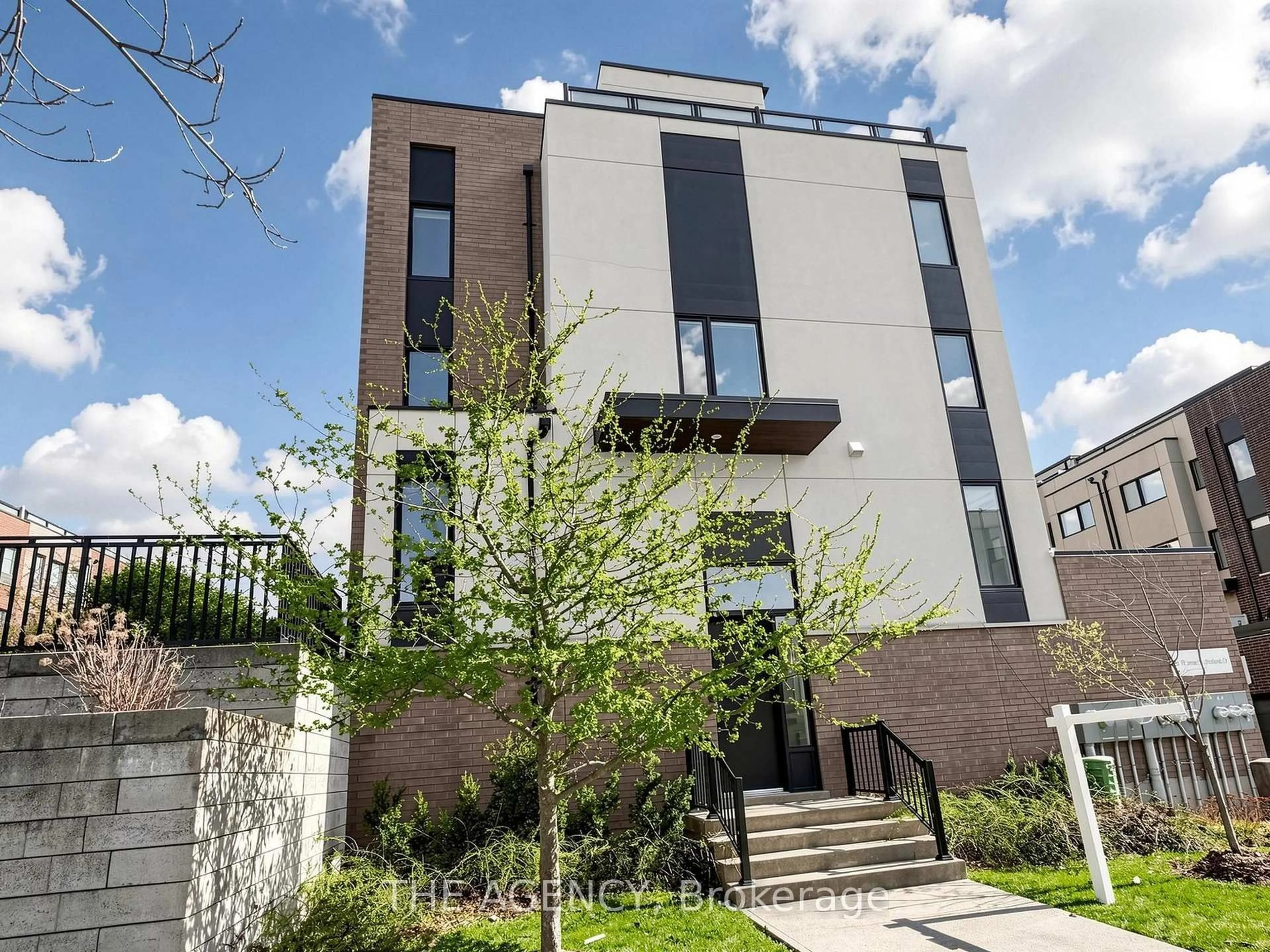 Home with brick exterior material, street for 55 Thomas Mulholland Dr #1, Toronto Ontario M3K 0A7