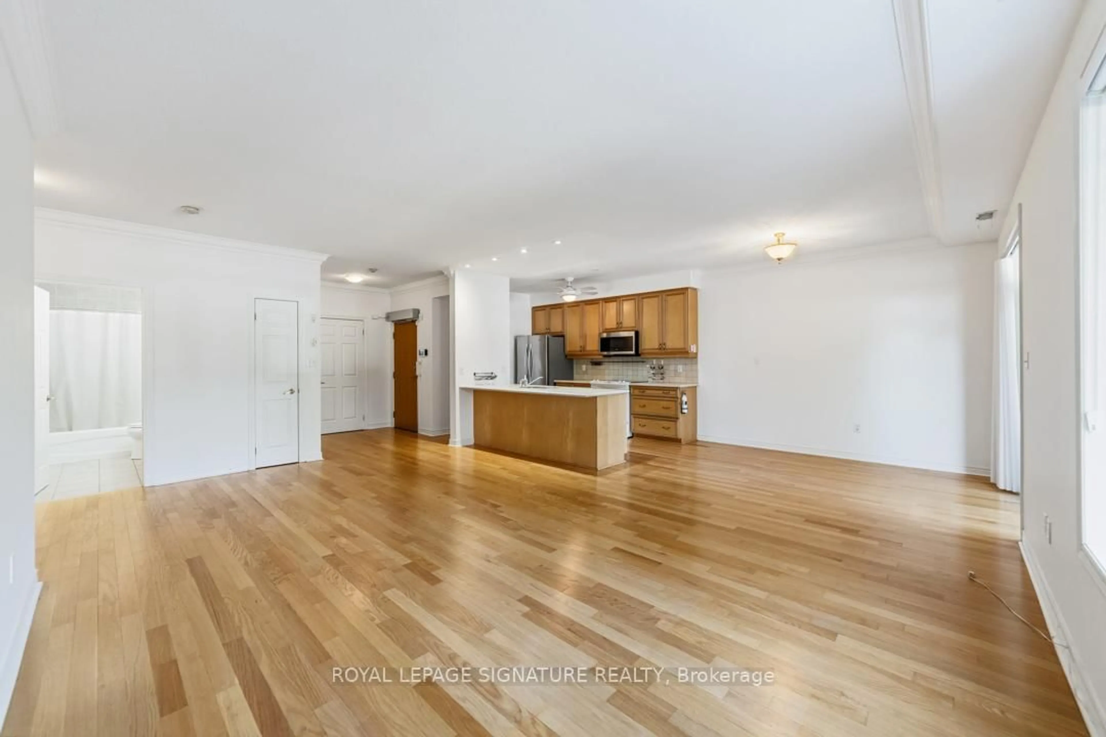 Open concept kitchen, wood/laminate floor for 443 Centennial Forest Dr #109, Milton Ontario L9T 6A1