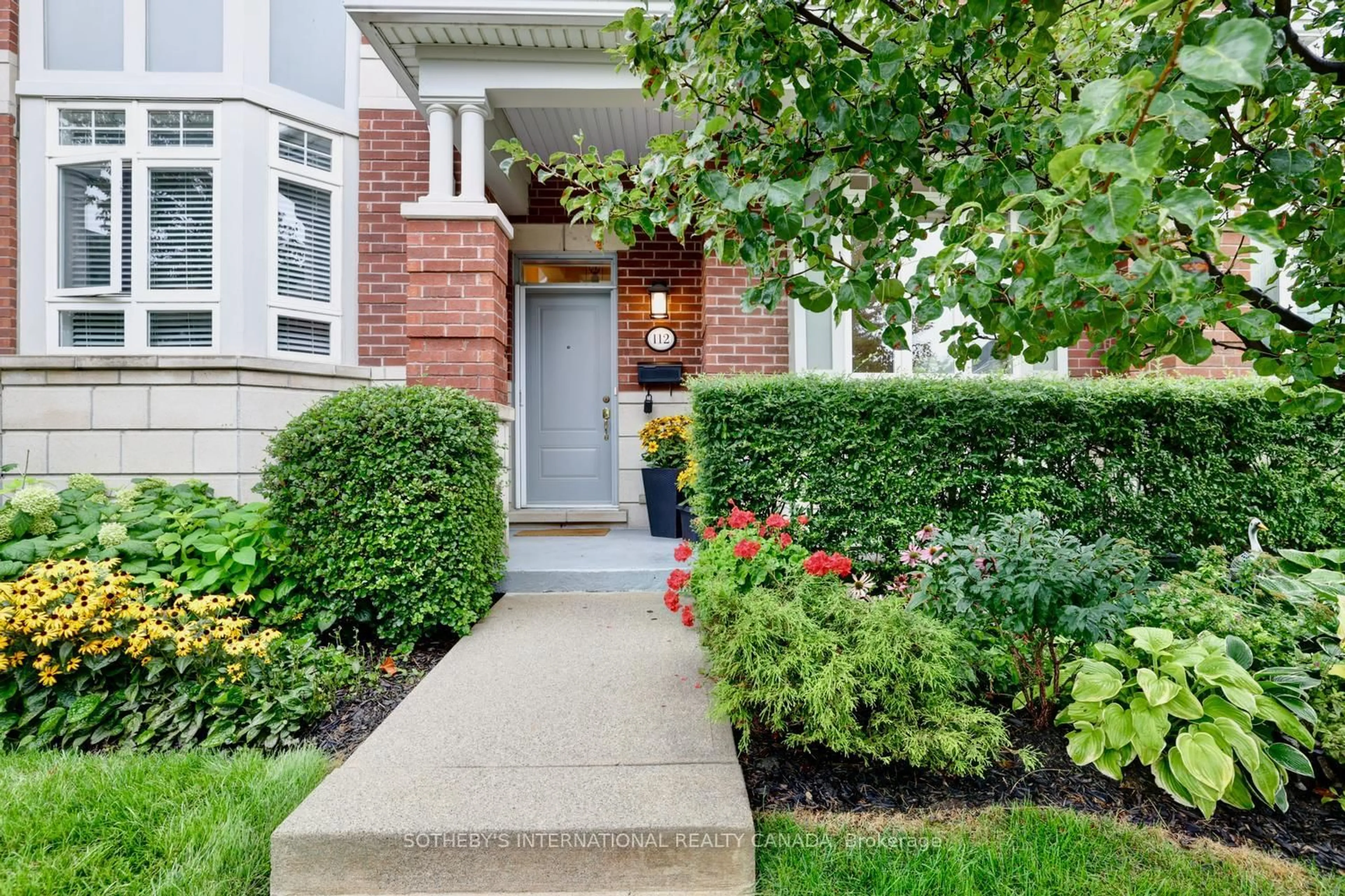 Home with brick exterior material, street for 112 Waterside Dr, Mississauga Ontario L5G 4T8
