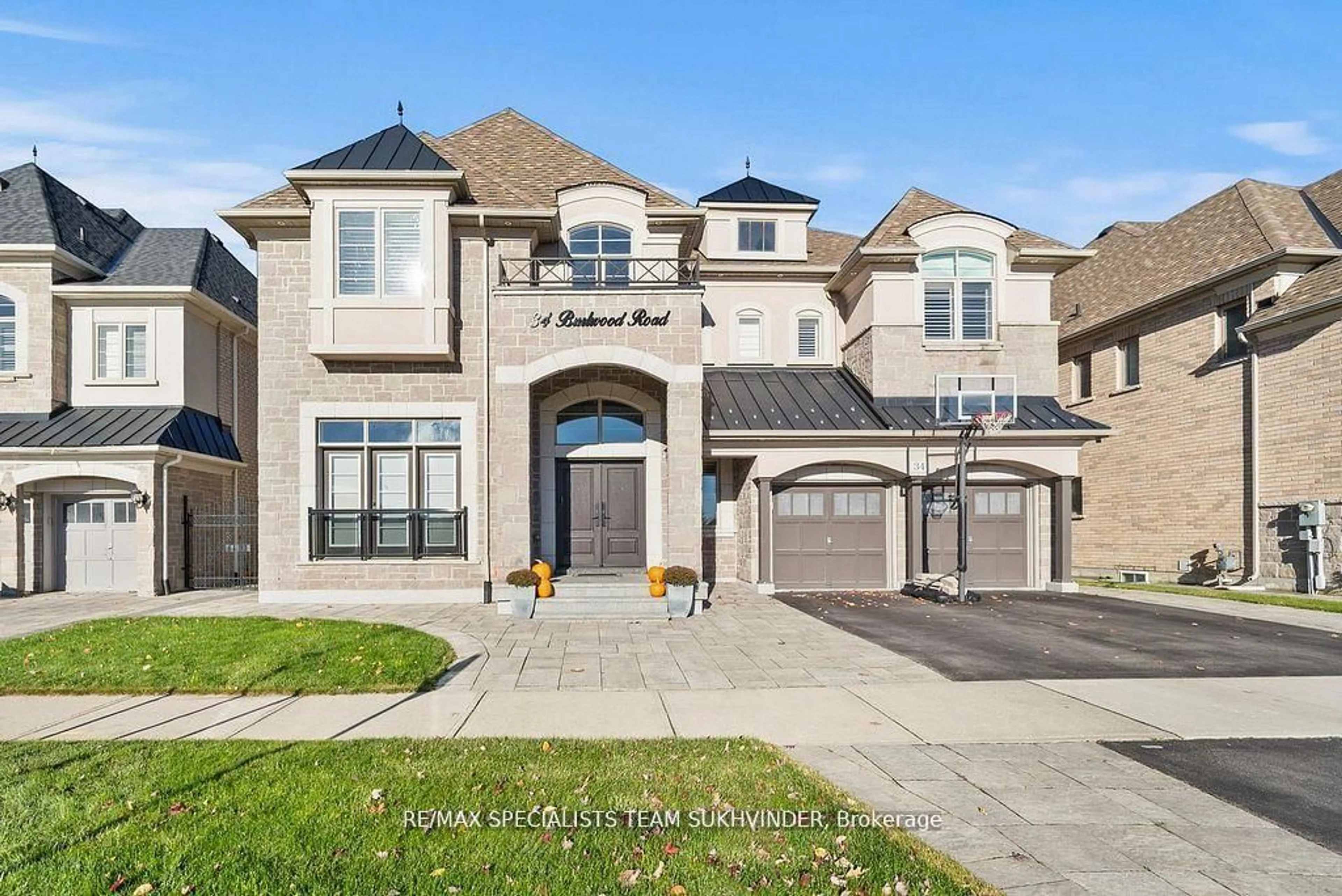 Home with brick exterior material, street for 34 Burlwood Rd, Brampton Ontario L6P 4E8