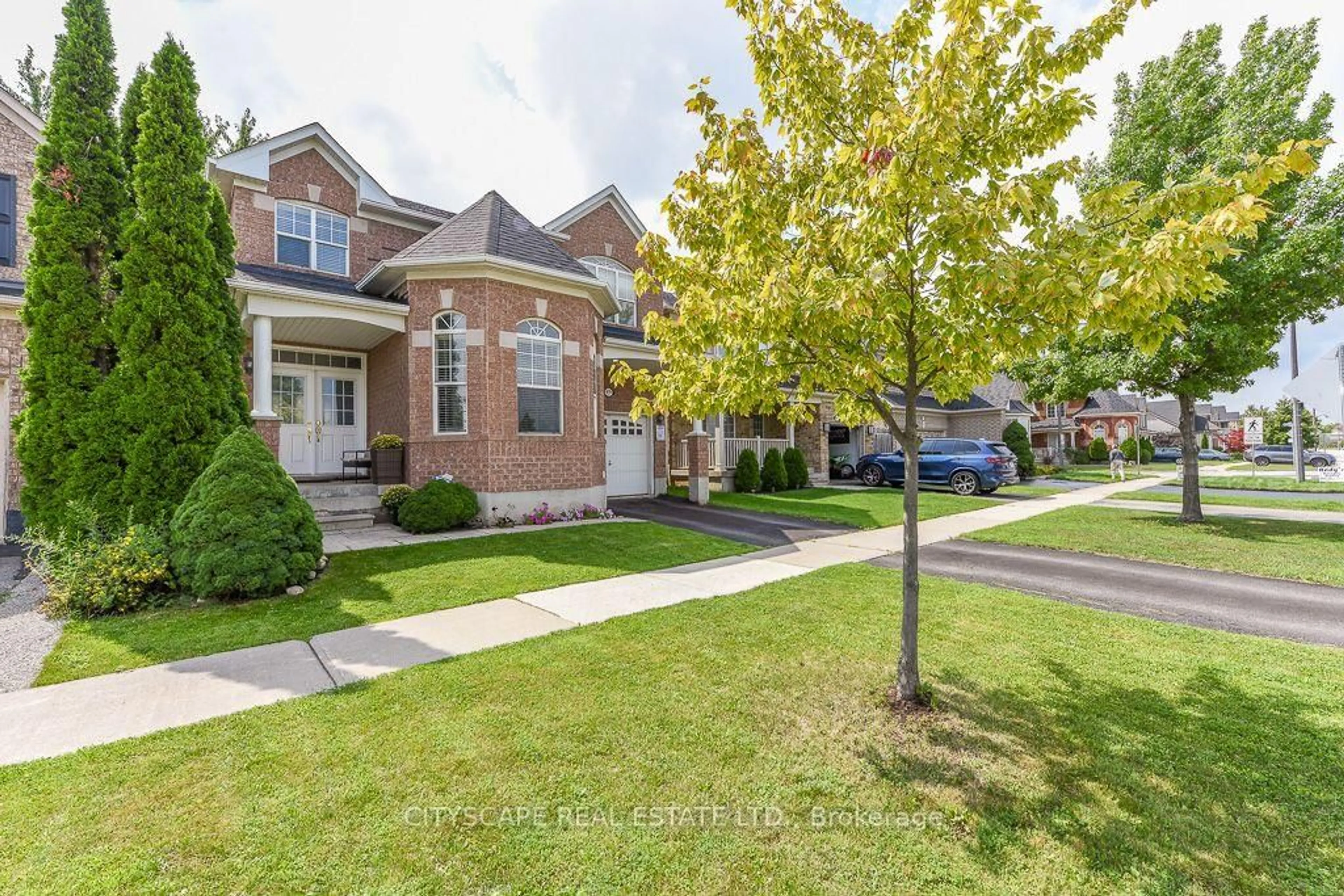 Home with brick exterior material, street for 879 Bennett Blvd, Milton Ontario L9T 6X9