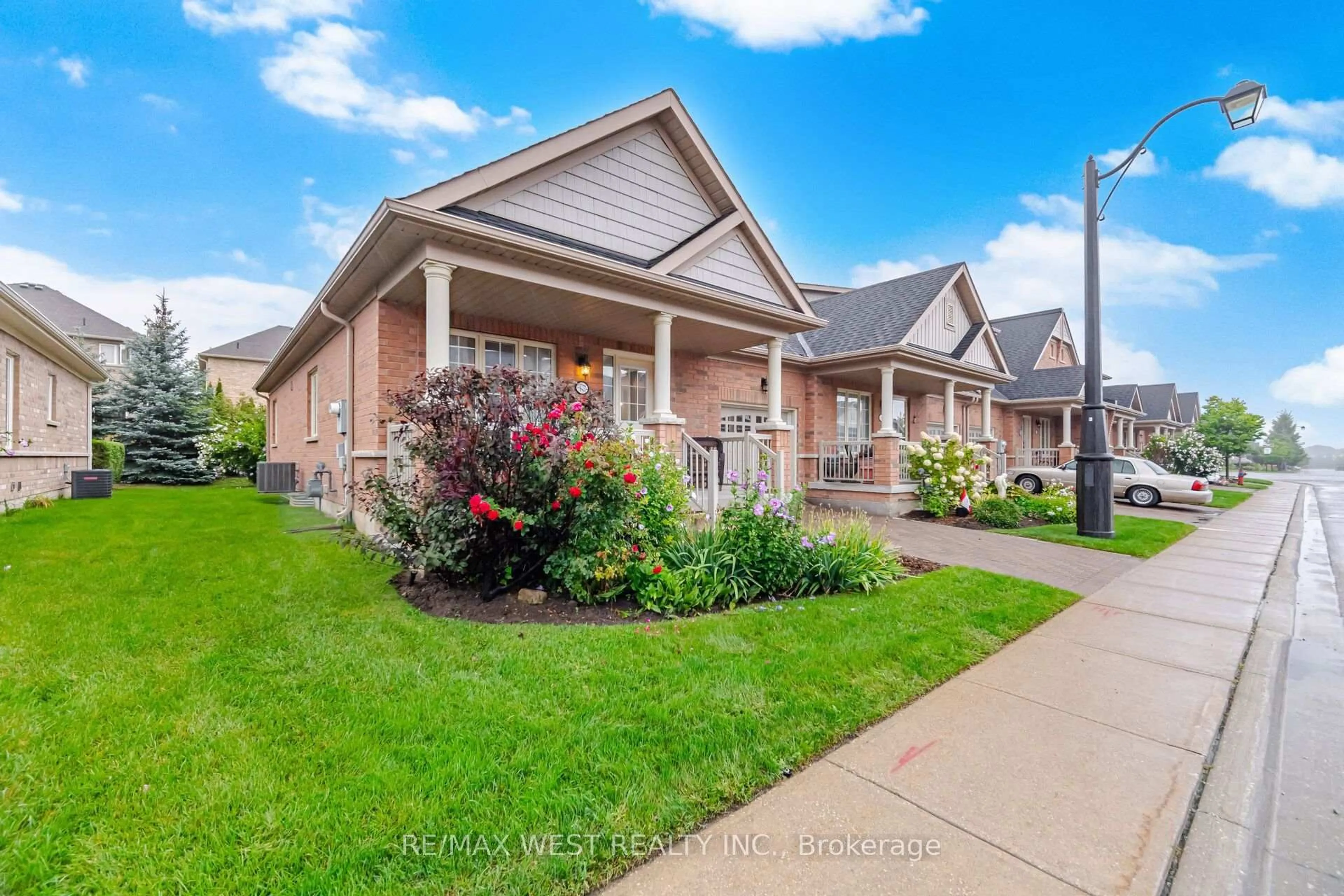 Home with brick exterior material, street for 12 Muzzo Dr, Brampton Ontario L6R 3W8