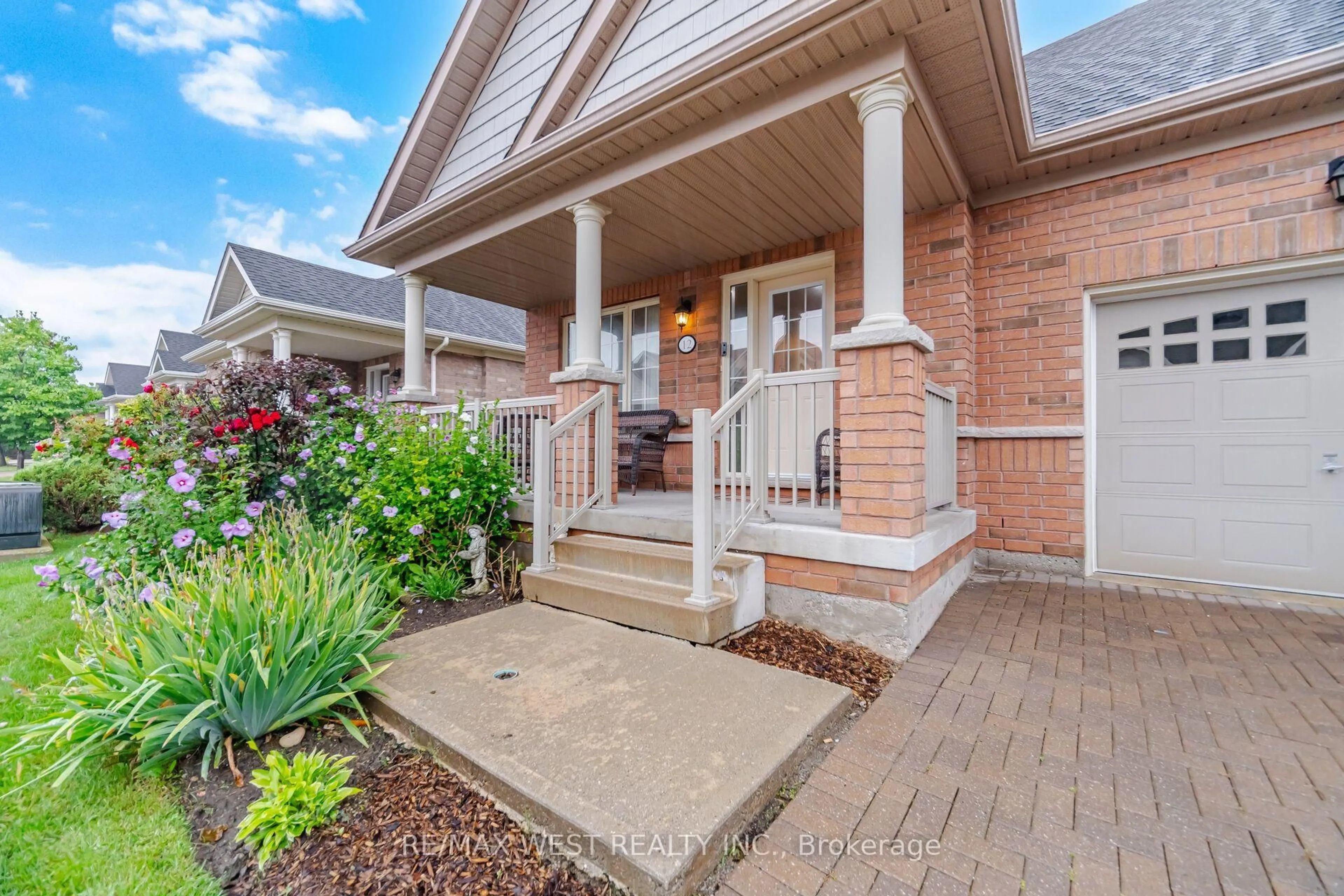 Home with brick exterior material, street for 12 Muzzo Dr, Brampton Ontario L6R 3W8