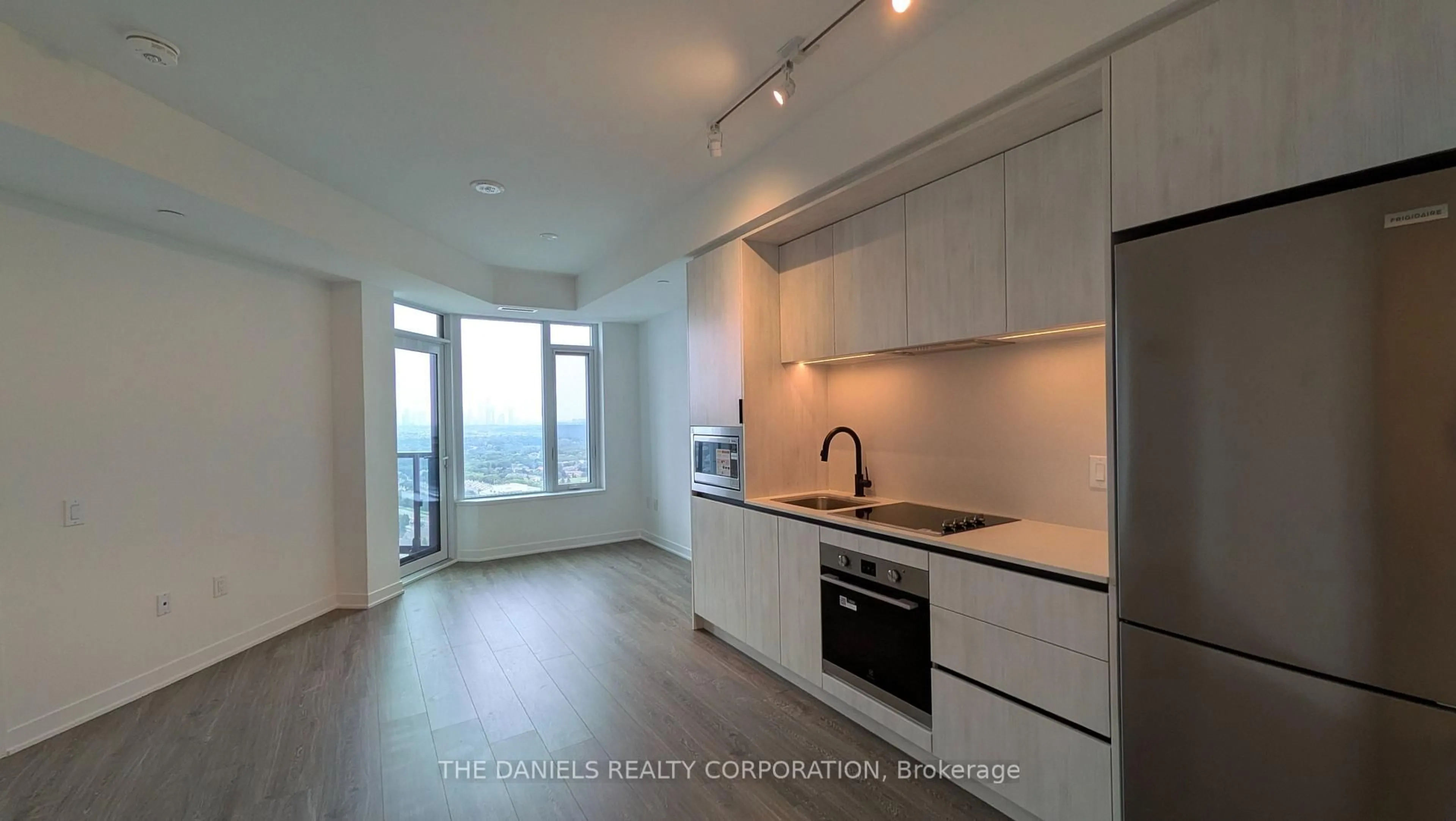 Open concept kitchen, unknown for 2495 Eglinton Ave #2401, Mississauga Ontario L5M 2T2