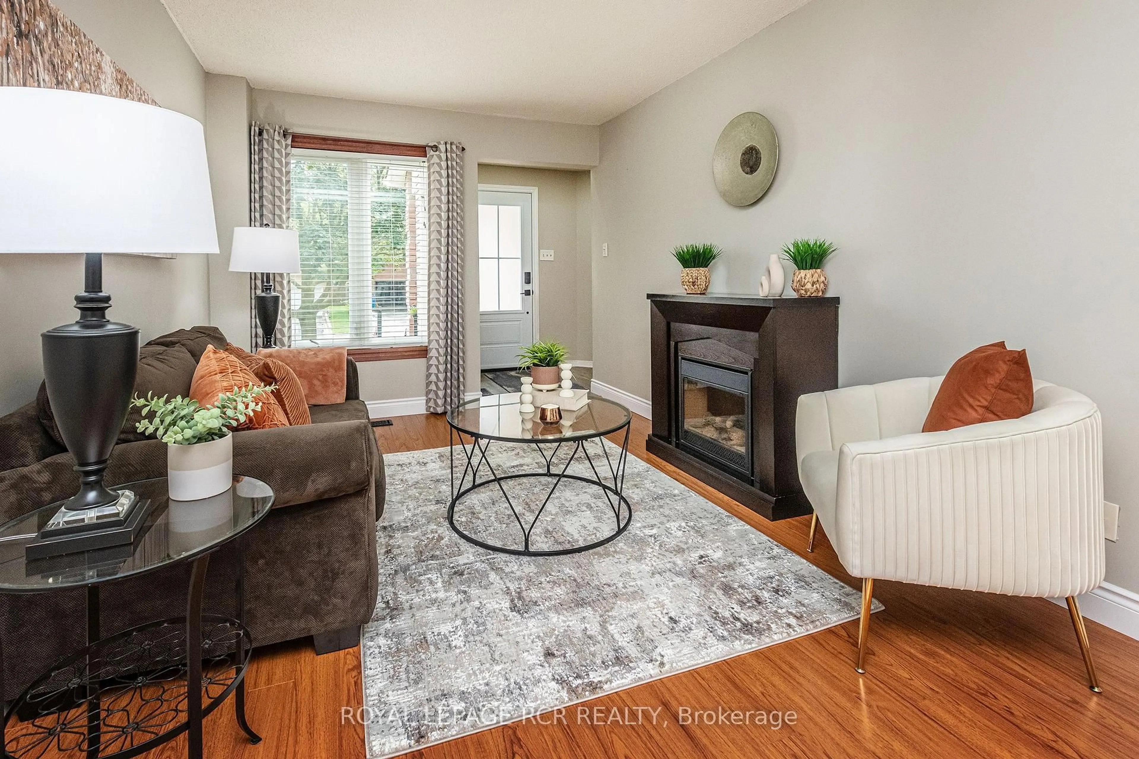 Living room with furniture, wood/laminate floor for 194 Lisa Marie Dr, Orangeville Ontario L9W 4P7