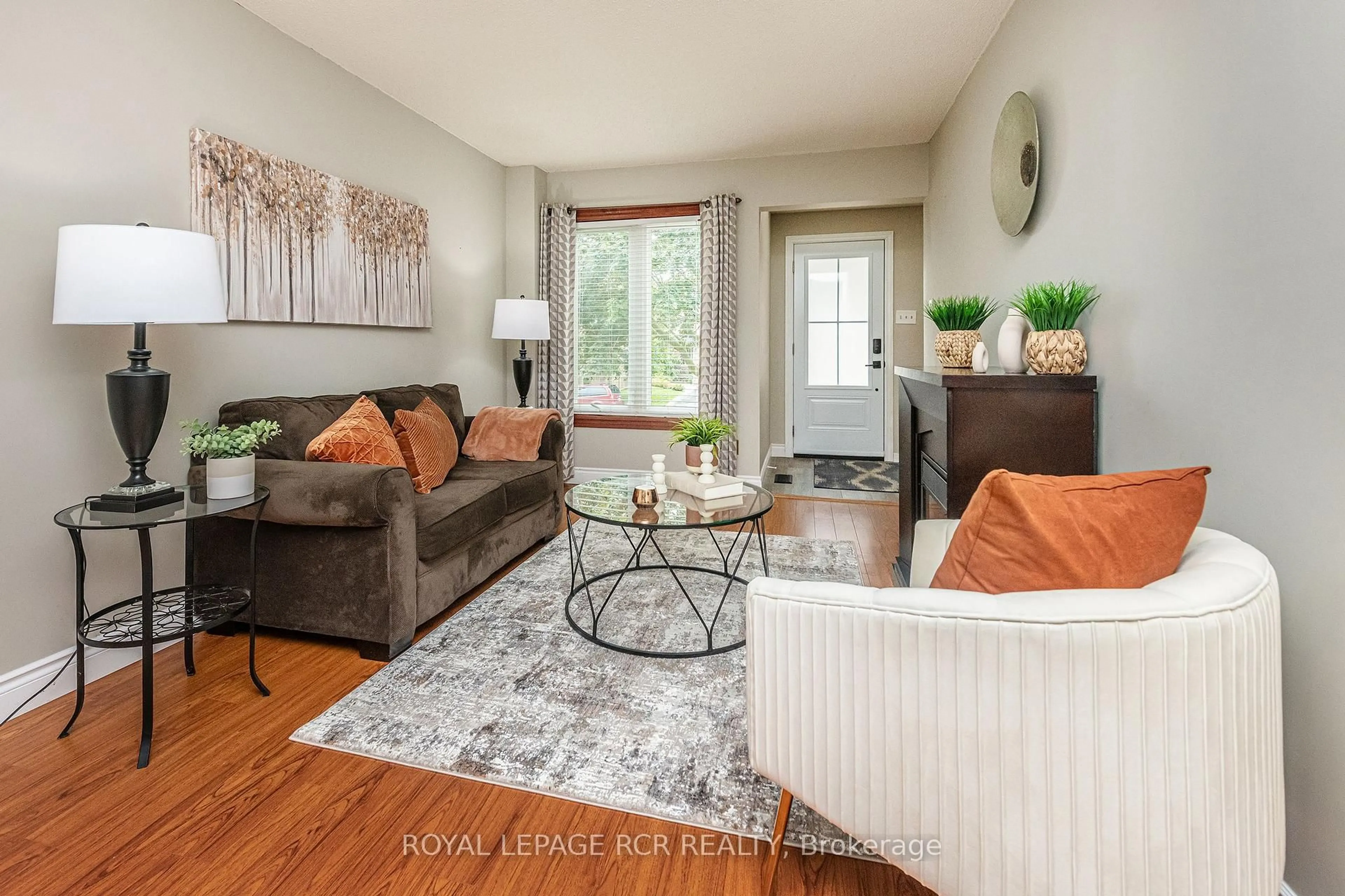 Living room with furniture, wood/laminate floor for 194 Lisa Marie Dr, Orangeville Ontario L9W 4P7