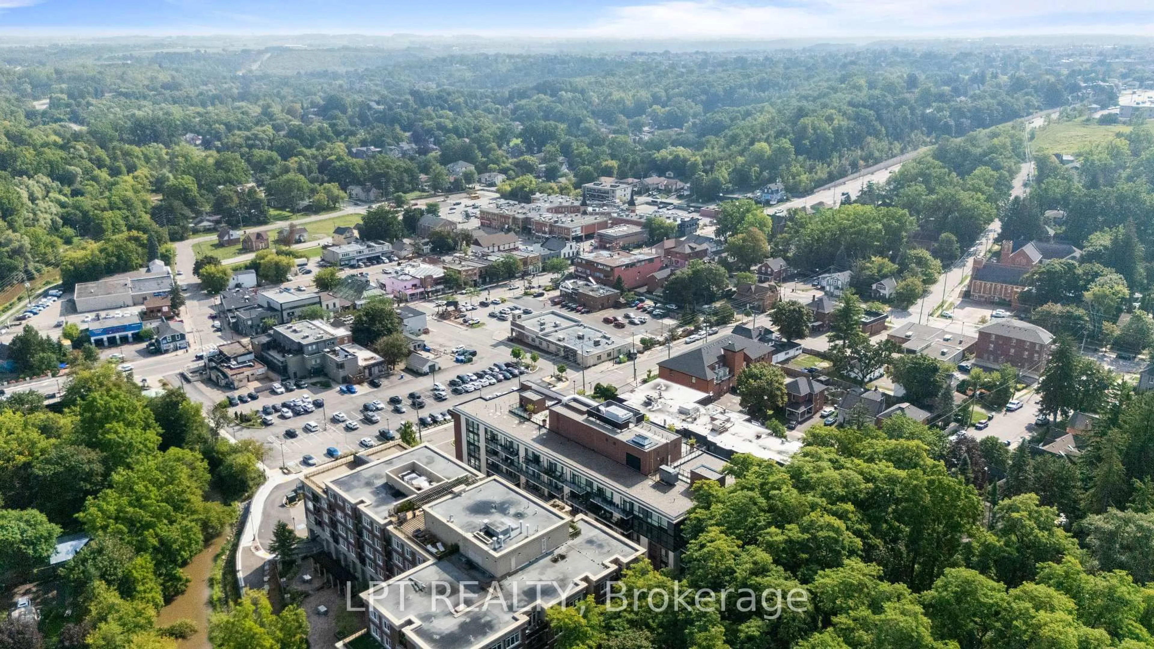 A pic from outside/outdoor area/front of a property/back of a property/a pic from drone, city buildings view from balcony for 50 Ann St #303, Caledon Ontario L7E 1B9