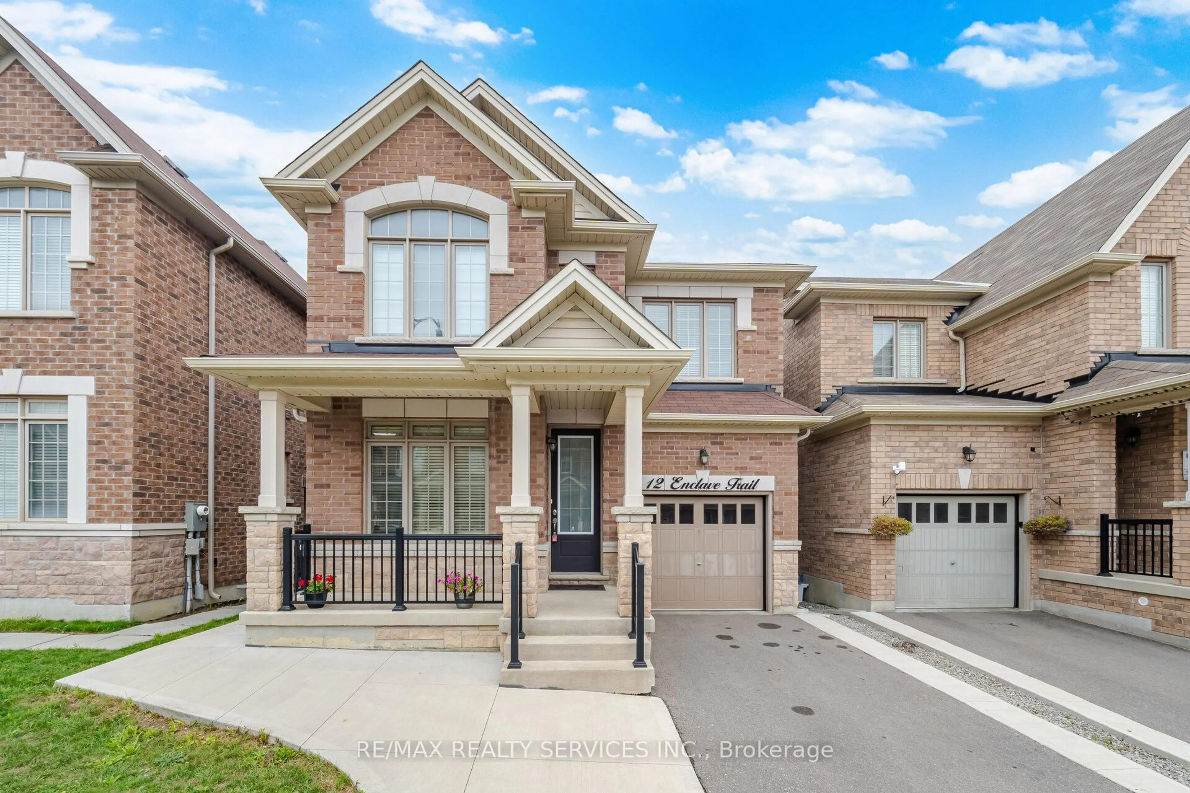 Home with brick exterior material, street for 12 Enclave Tr, Brampton Ontario L6R 4B3