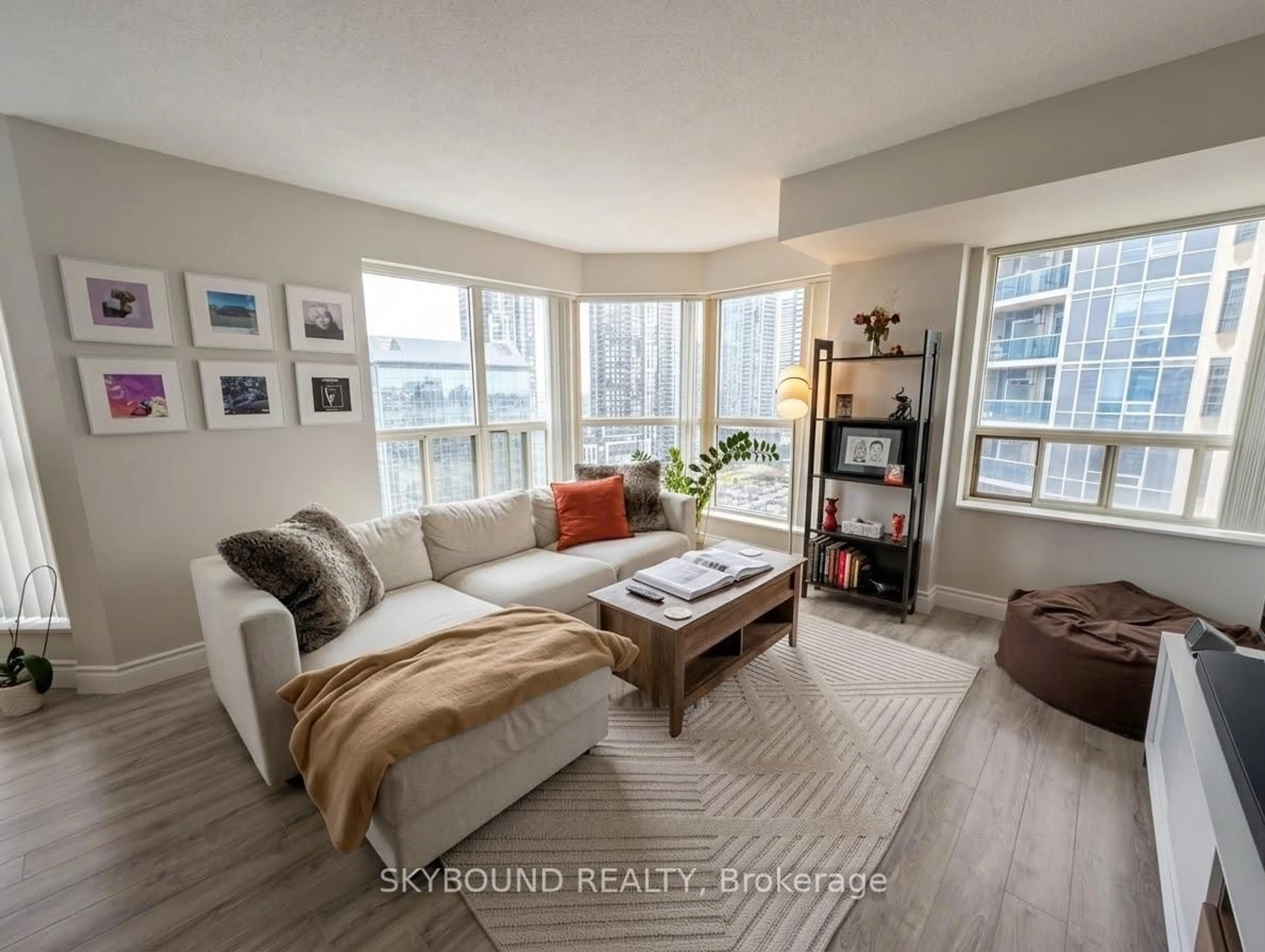 Living room with furniture, unknown for 335 Webb Dr #1803, Mississauga Ontario L5B 4A1