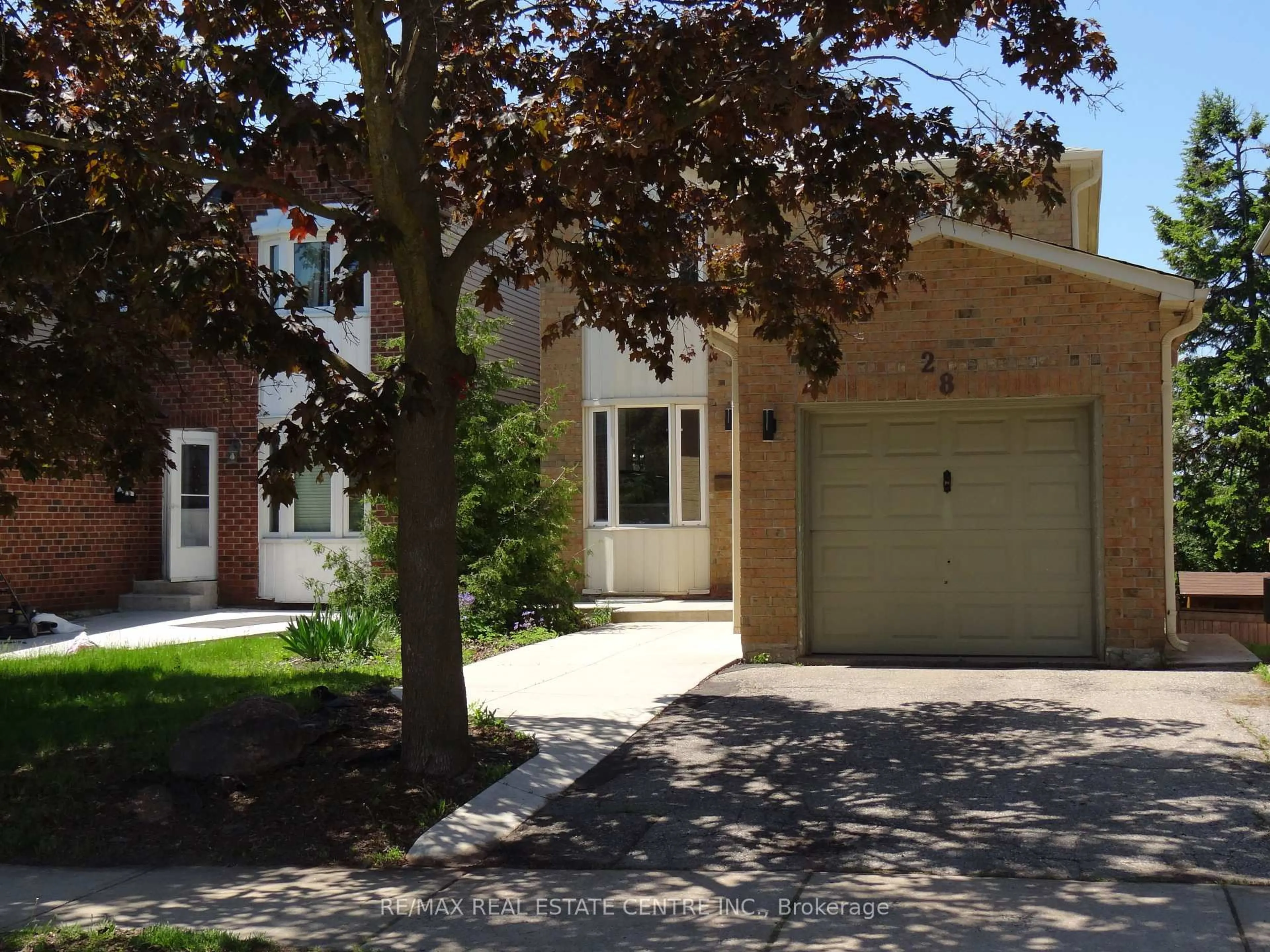 Home with brick exterior material, street for 28 Rawling Cres, Brampton Ontario L6Z 1N8