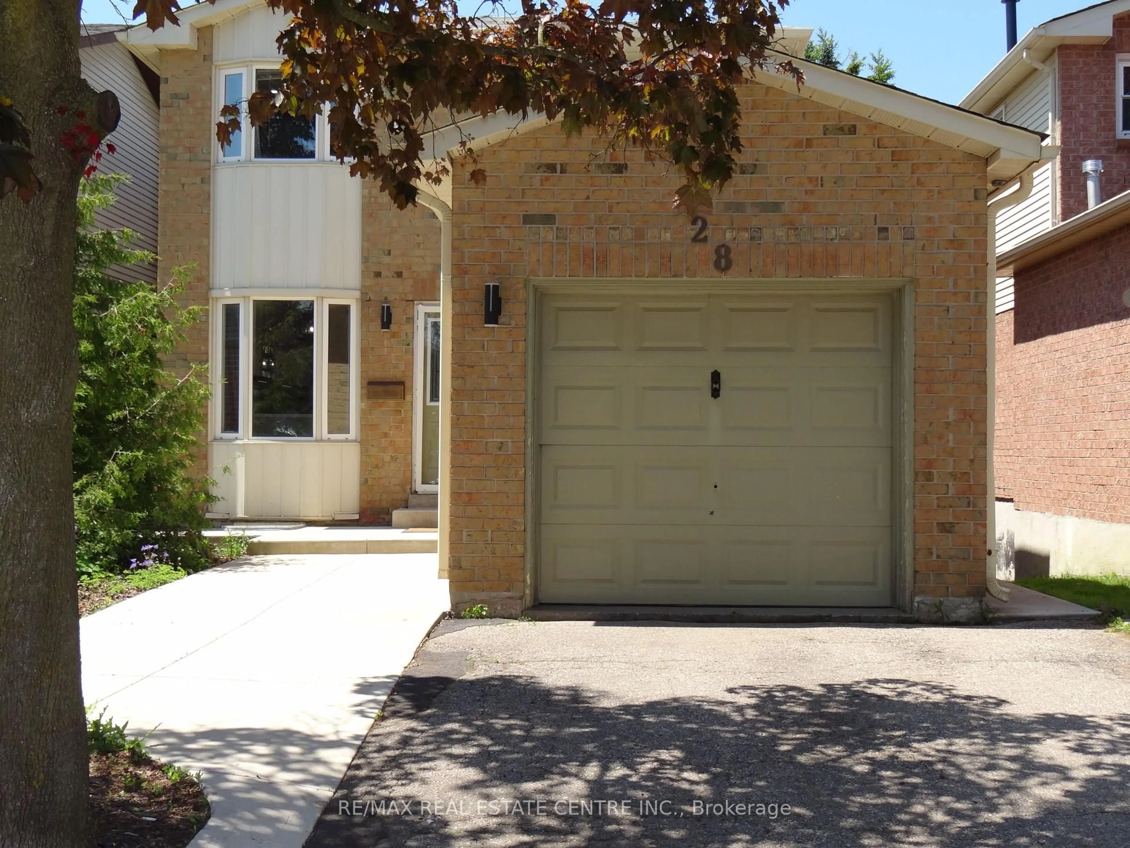 Home with brick exterior material, street for 28 Rawling Cres, Brampton Ontario L6Z 1N8