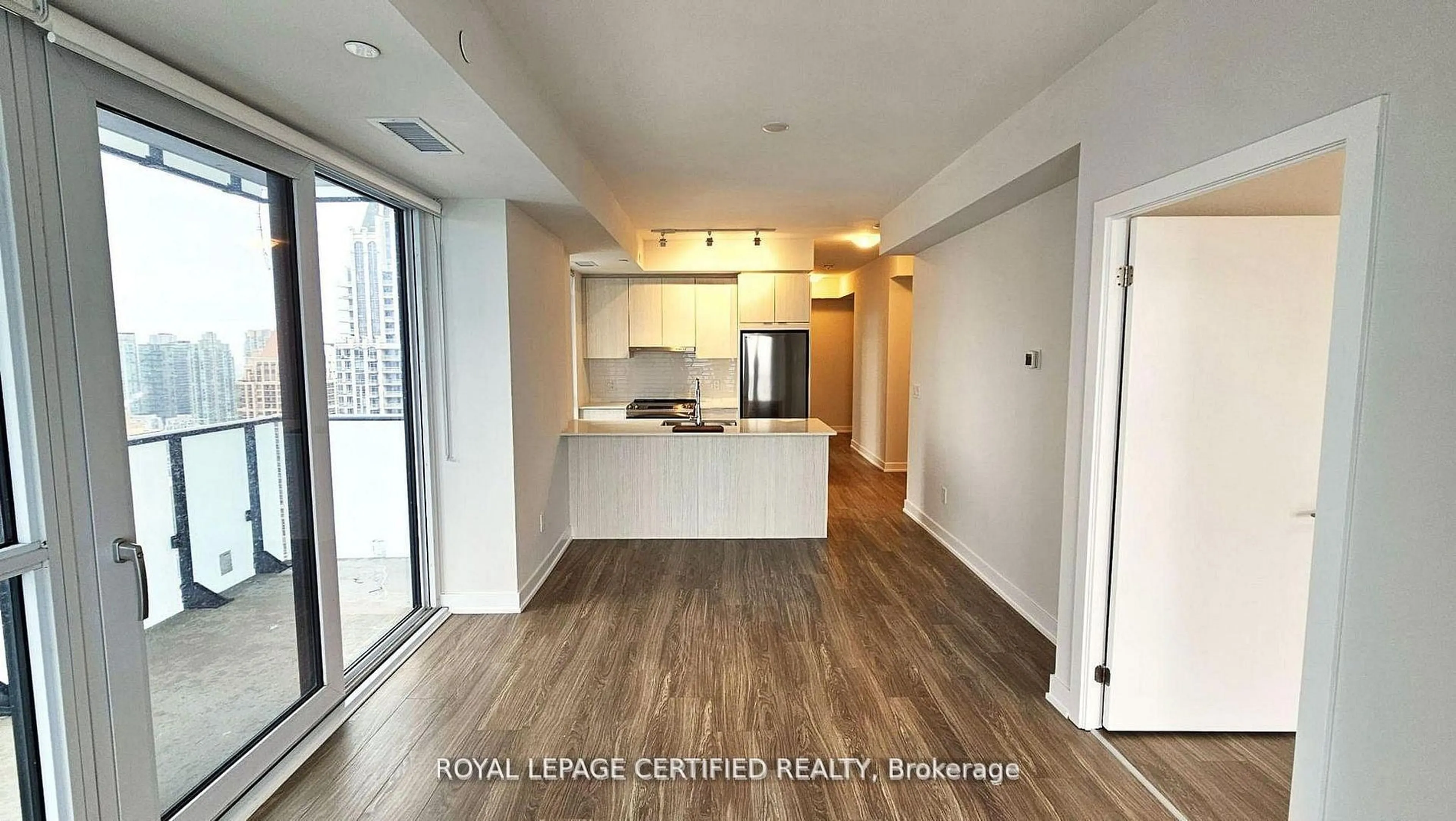 Open concept kitchen, wood/laminate floor for 430 Square One Dr #3011, Mississauga Ontario L5B 0L6