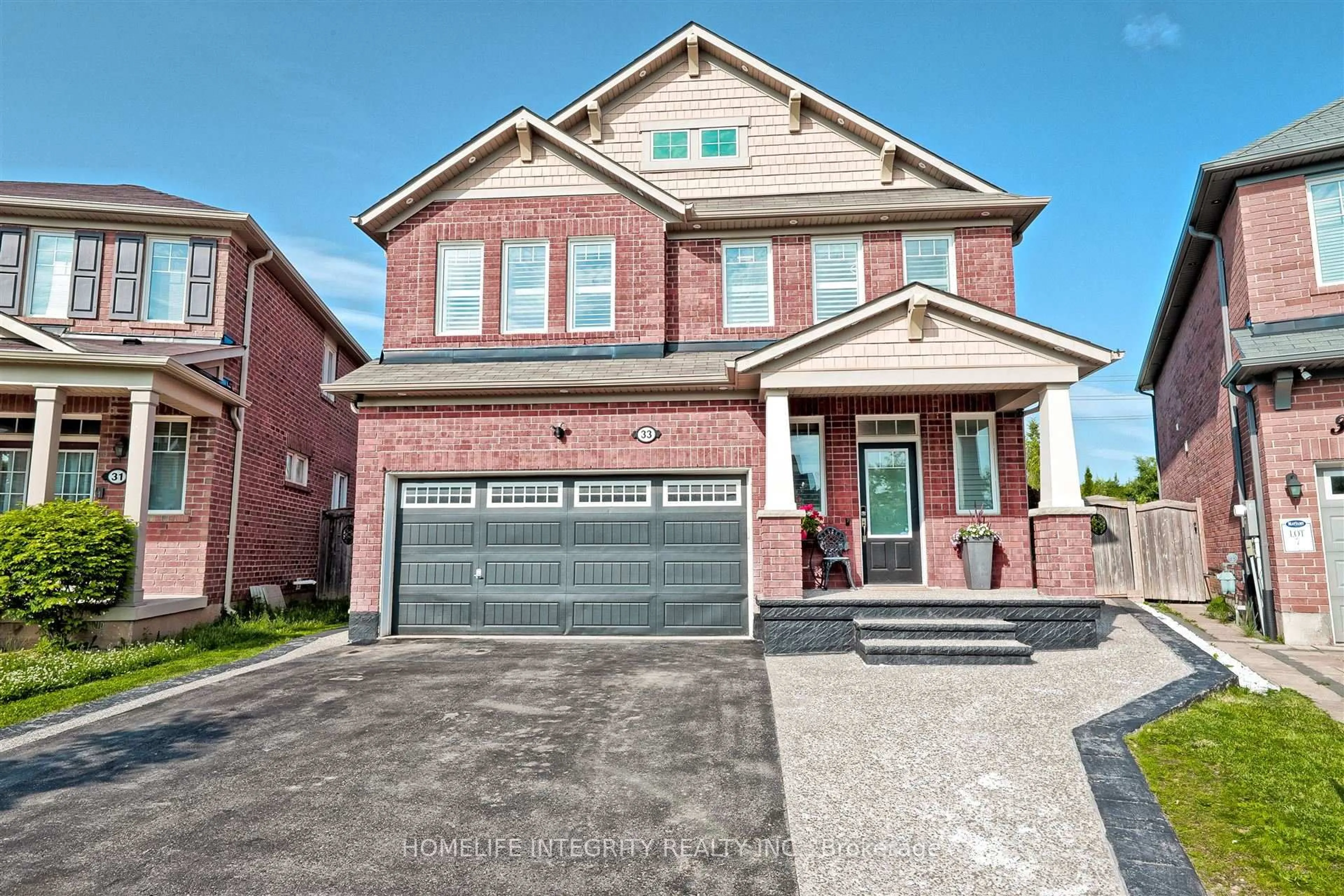 Home with brick exterior material, street for 33 Klemscott Rd, Brampton Ontario L7A 0P5