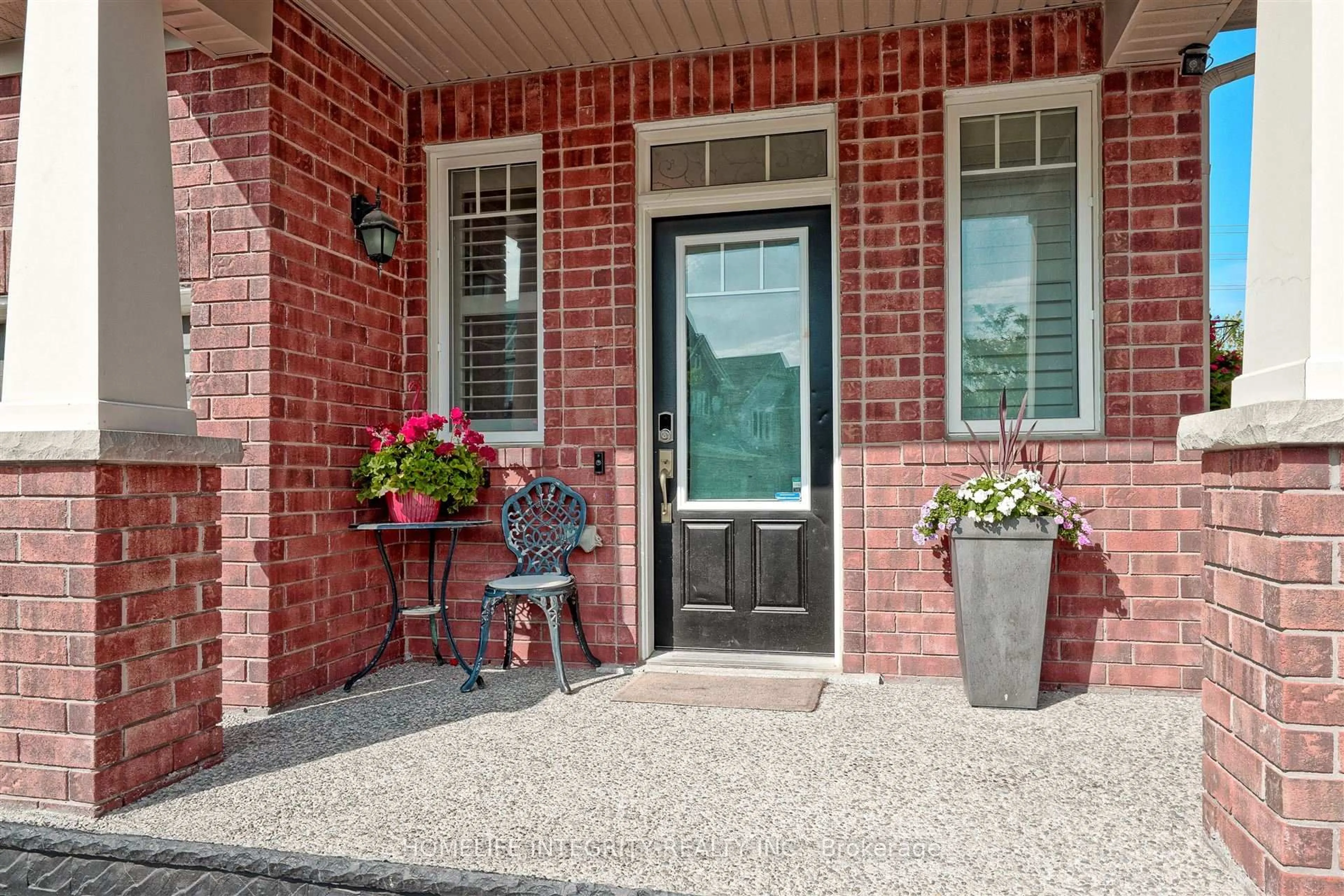 Home with brick exterior material, street for 33 Klemscott Rd, Brampton Ontario L7A 0P5
