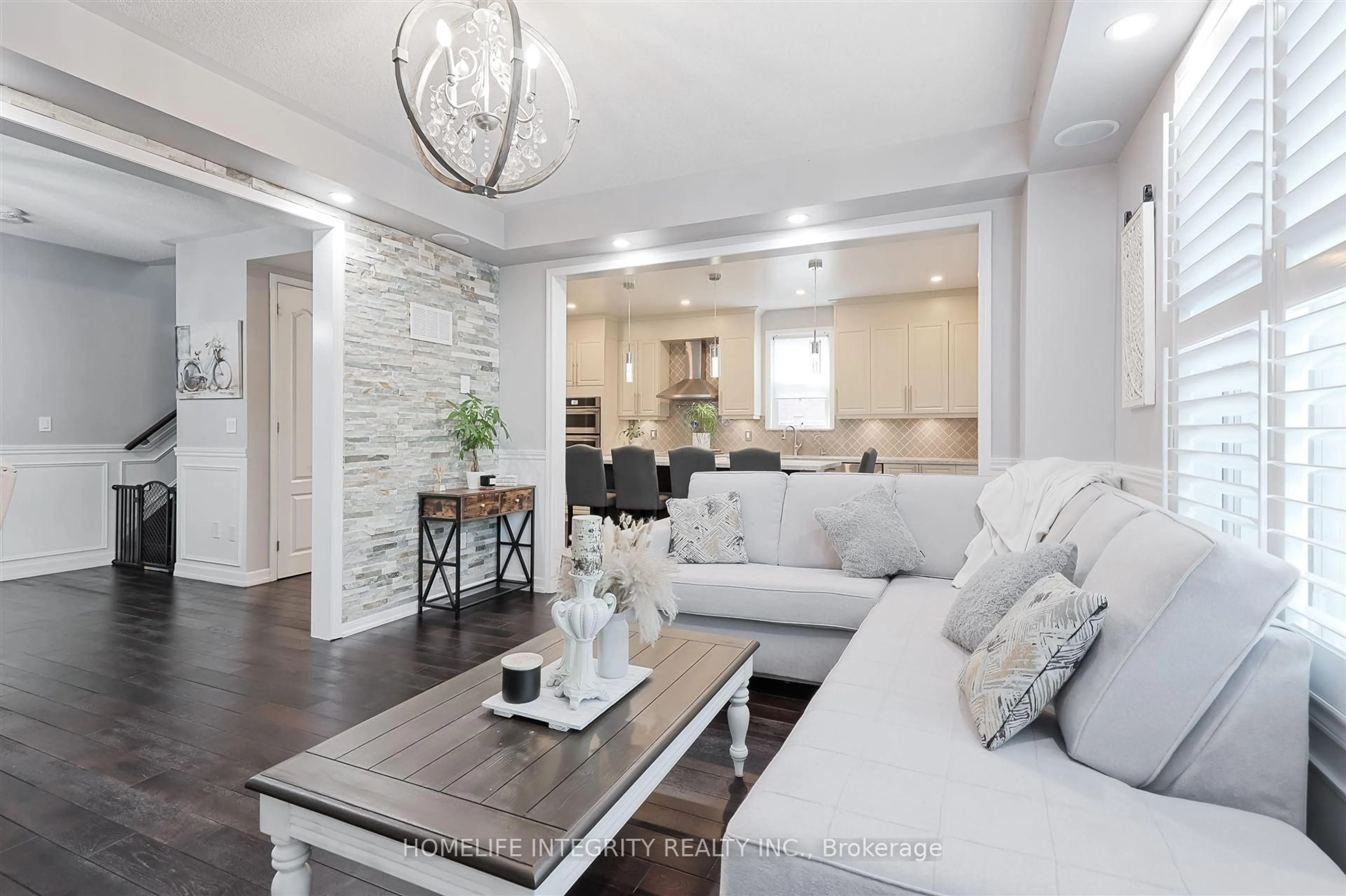 Living room with furniture, unknown for 33 Klemscott Rd, Brampton Ontario L7A 0P5