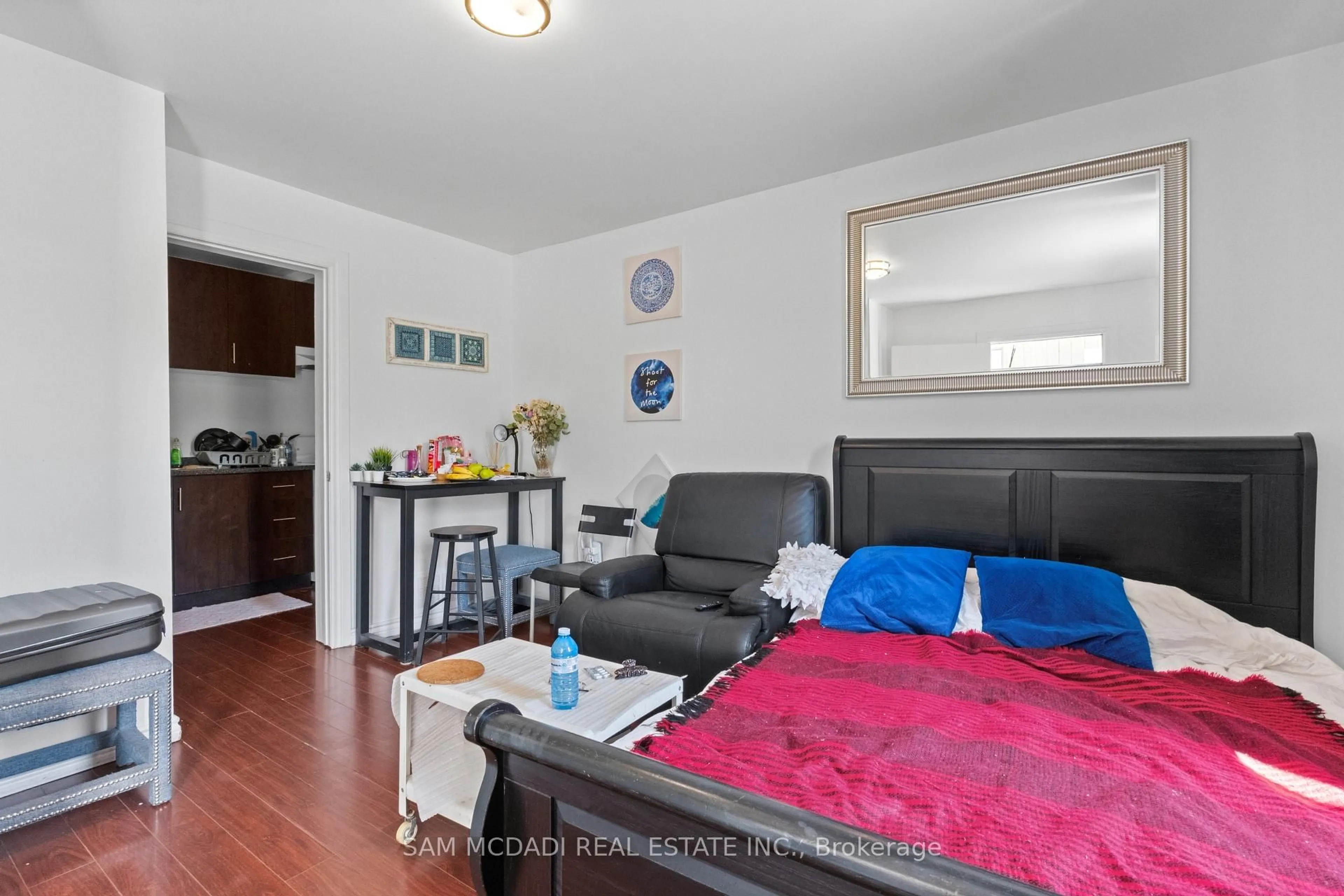 Living room with furniture, wood/laminate floor for 19 Toffee Crt, Toronto Ontario M8V 3B9