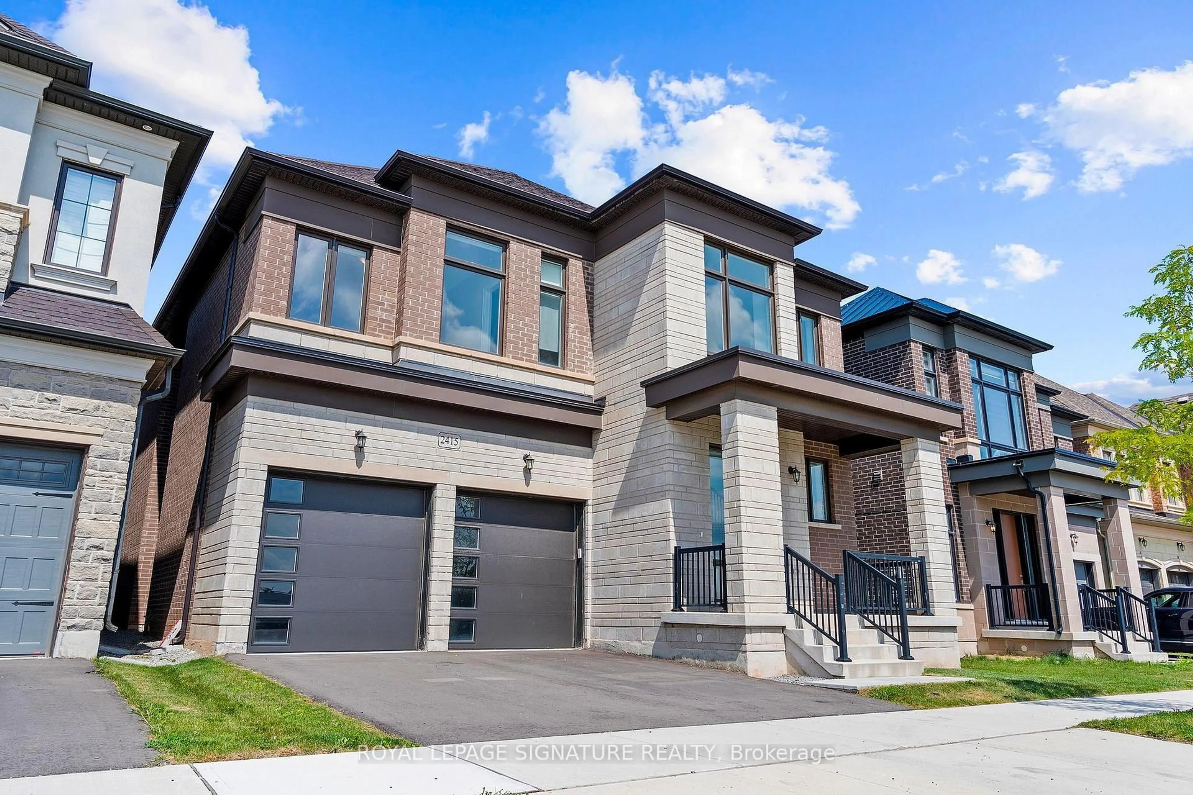 Home with brick exterior material, street for 2415 Saw Whet Blvd, Oakville Ontario L6M 5L5