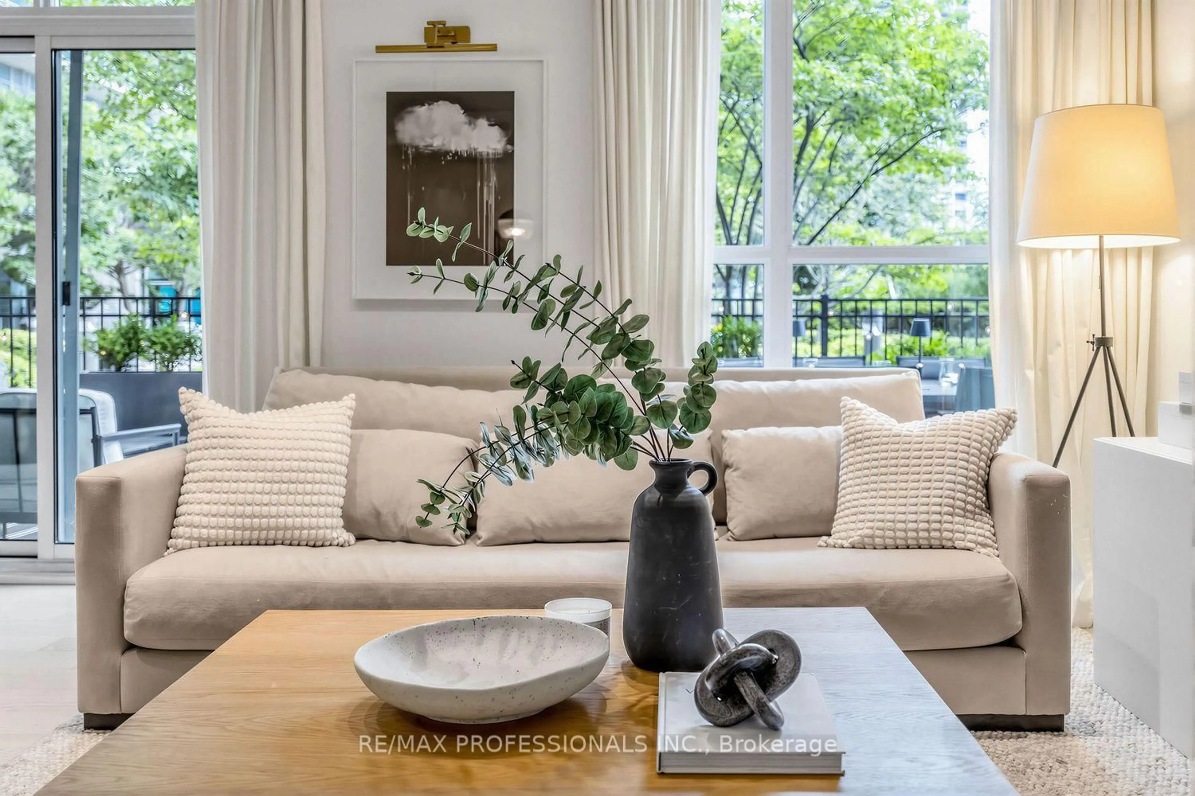 Living room with furniture, unknown for 155 Legion Rd #402, Toronto Ontario M8Y 0A7