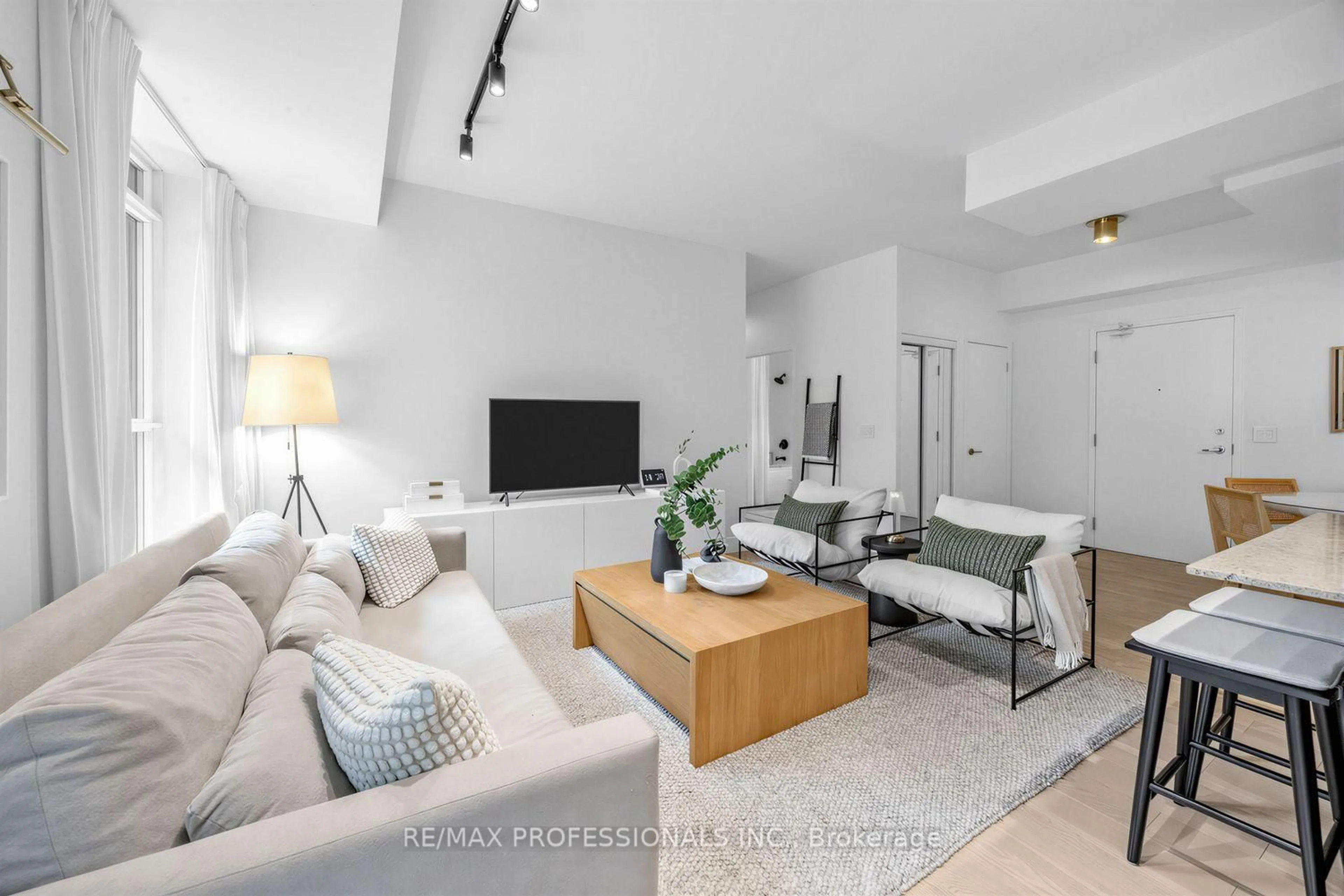 Living room with furniture, unknown for 155 Legion Rd #402, Toronto Ontario M8Y 0A7