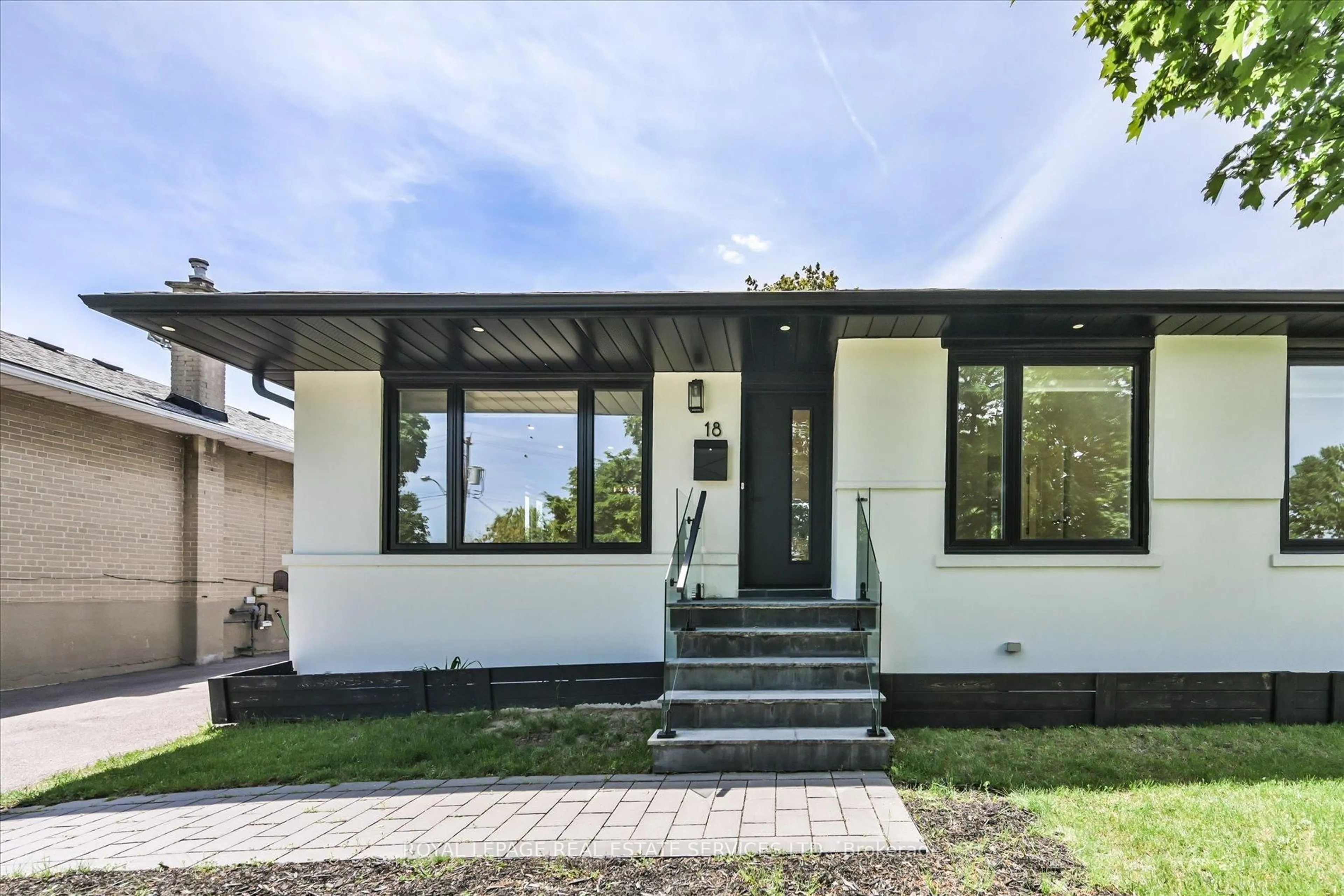 Home with brick exterior material, street for 18 Celestine Dr, Toronto Ontario M9R 3N1