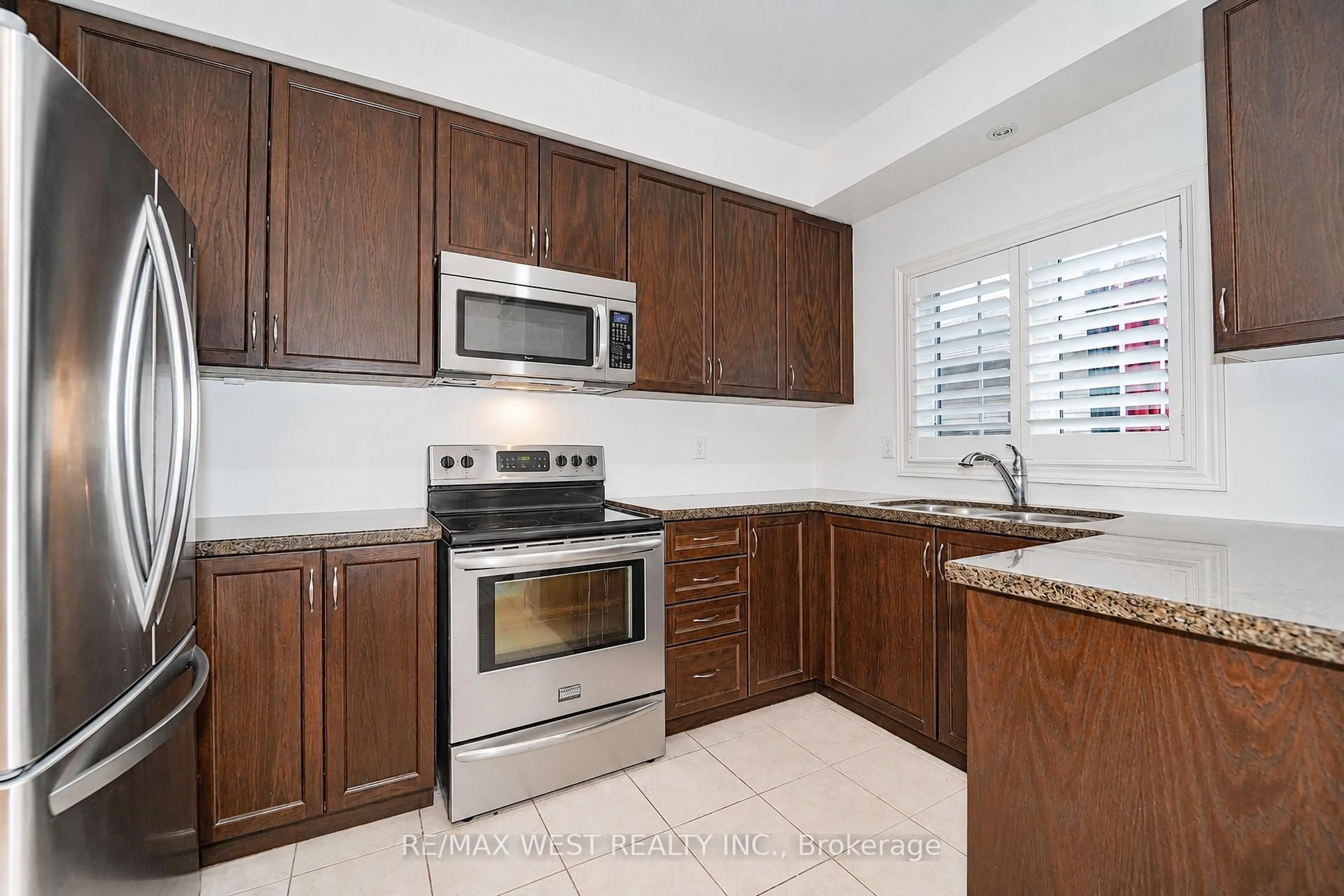 Standard kitchen, ceramic/tile floor for 221 Isaac Devins Blvd, Toronto Ontario M9M 0B6