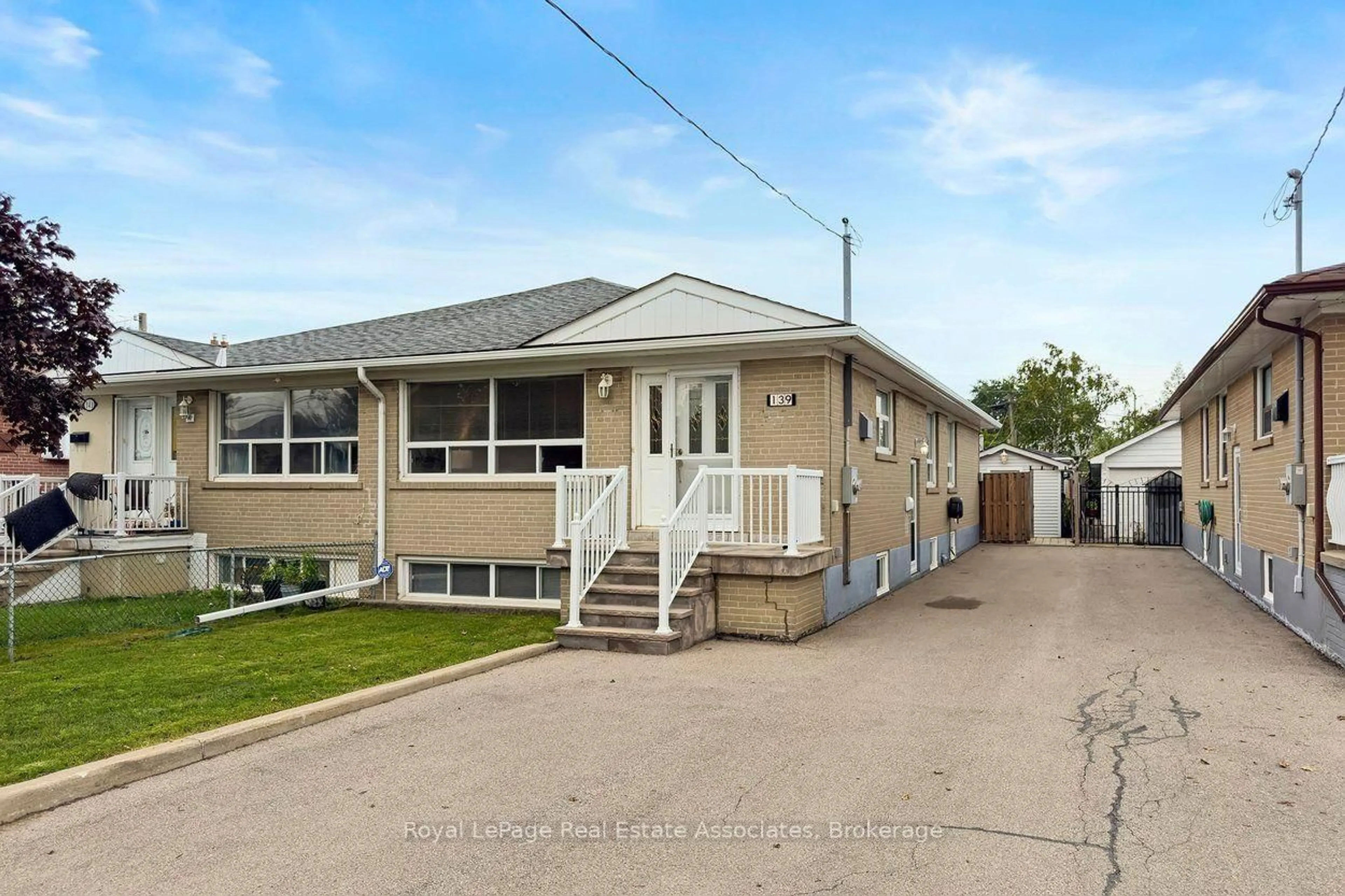 Home with vinyl exterior material, street for 139 Vodden St, Brampton Ontario L6V 1M6