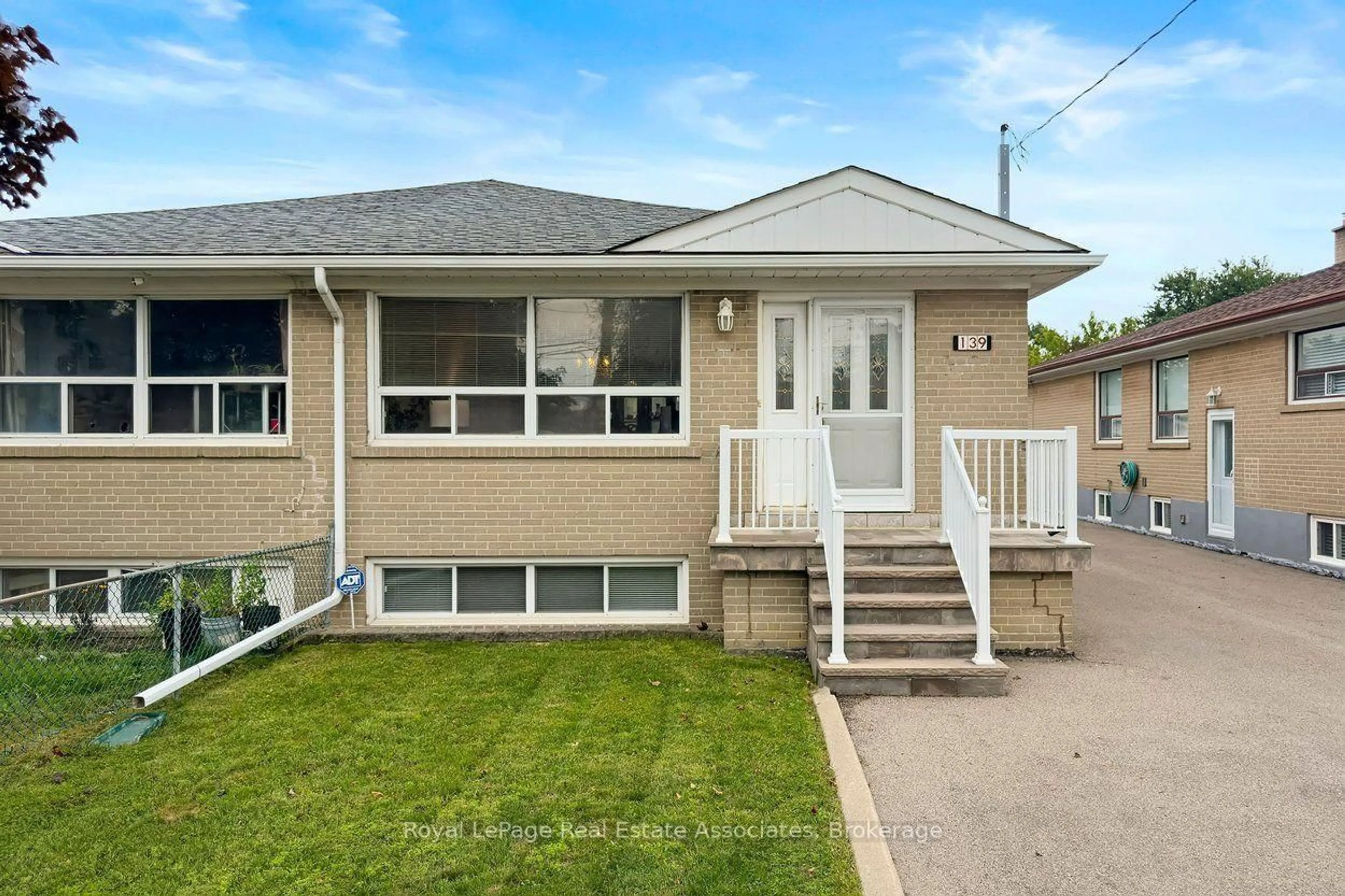 Home with vinyl exterior material, street for 139 Vodden St, Brampton Ontario L6V 1M6