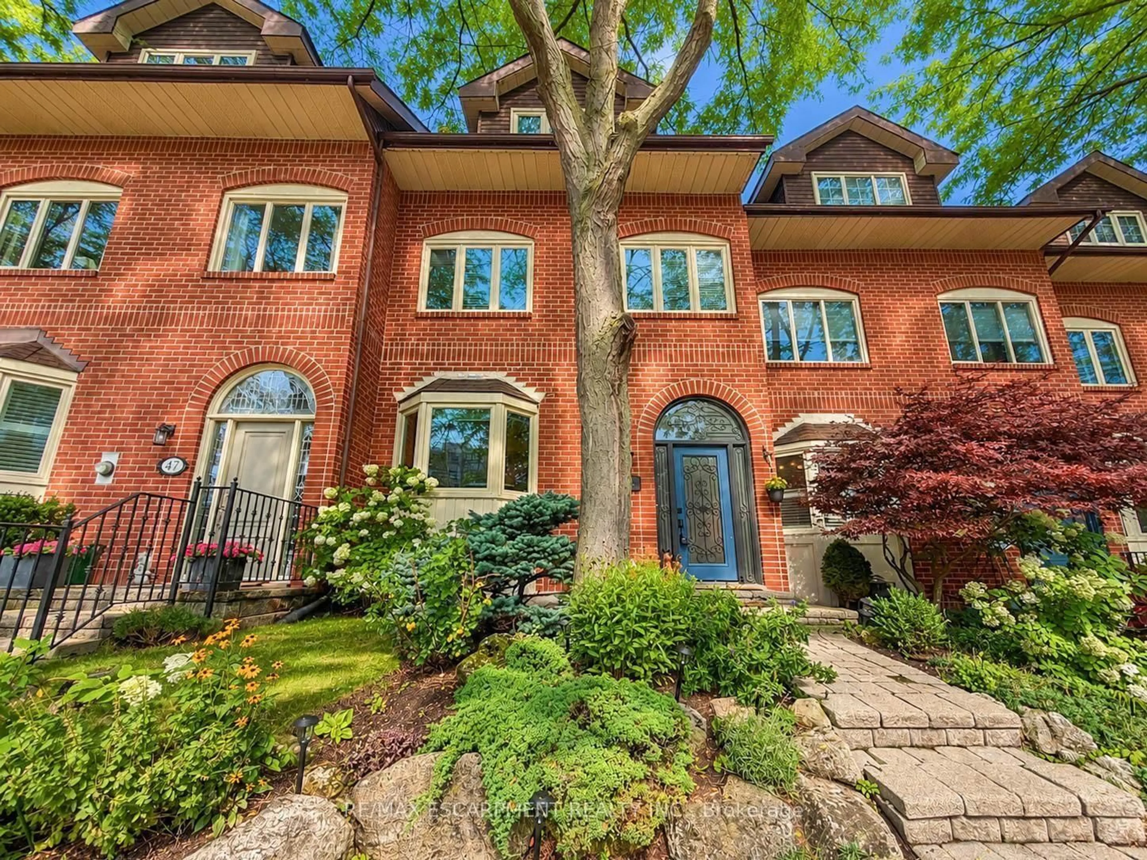 Home with brick exterior material, street for 45 Tradewind Dr, Oakville Ontario L6L 6K9