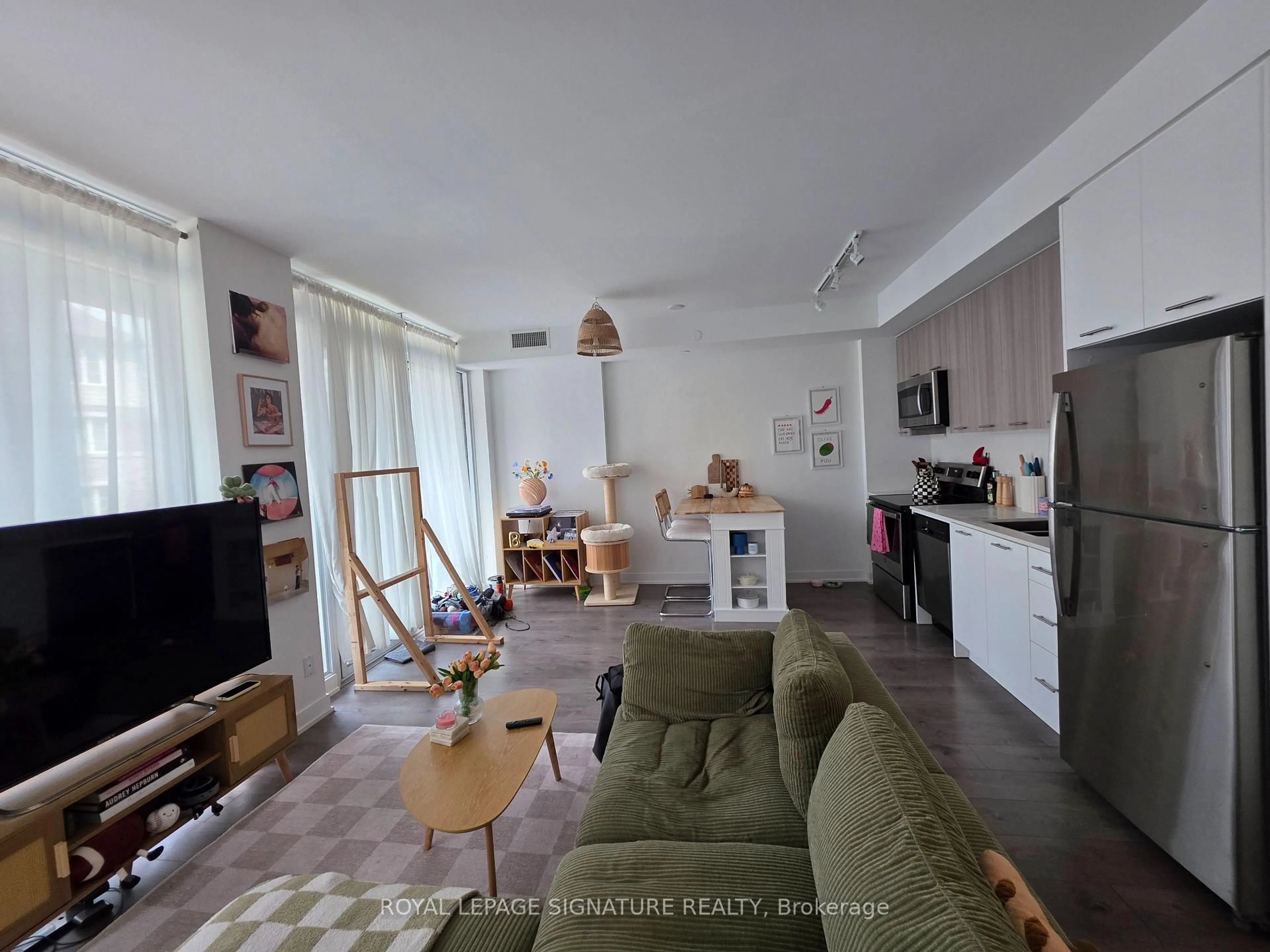 Living room with furniture, unknown for 180 Veterans Dr #210, Brampton Ontario L7A 5G7