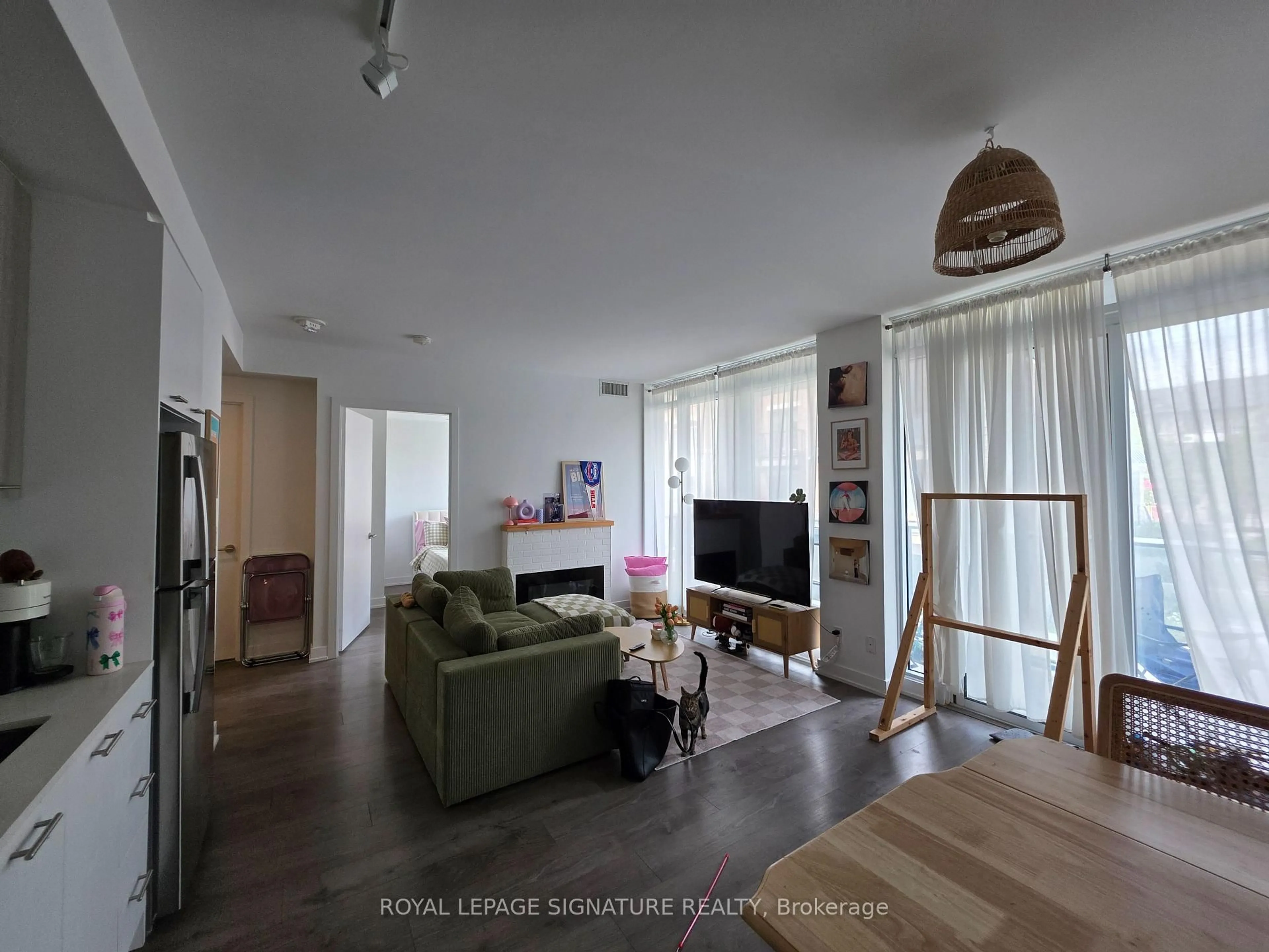 Living room with furniture, unknown for 180 Veterans Dr #210, Brampton Ontario L7A 5G7