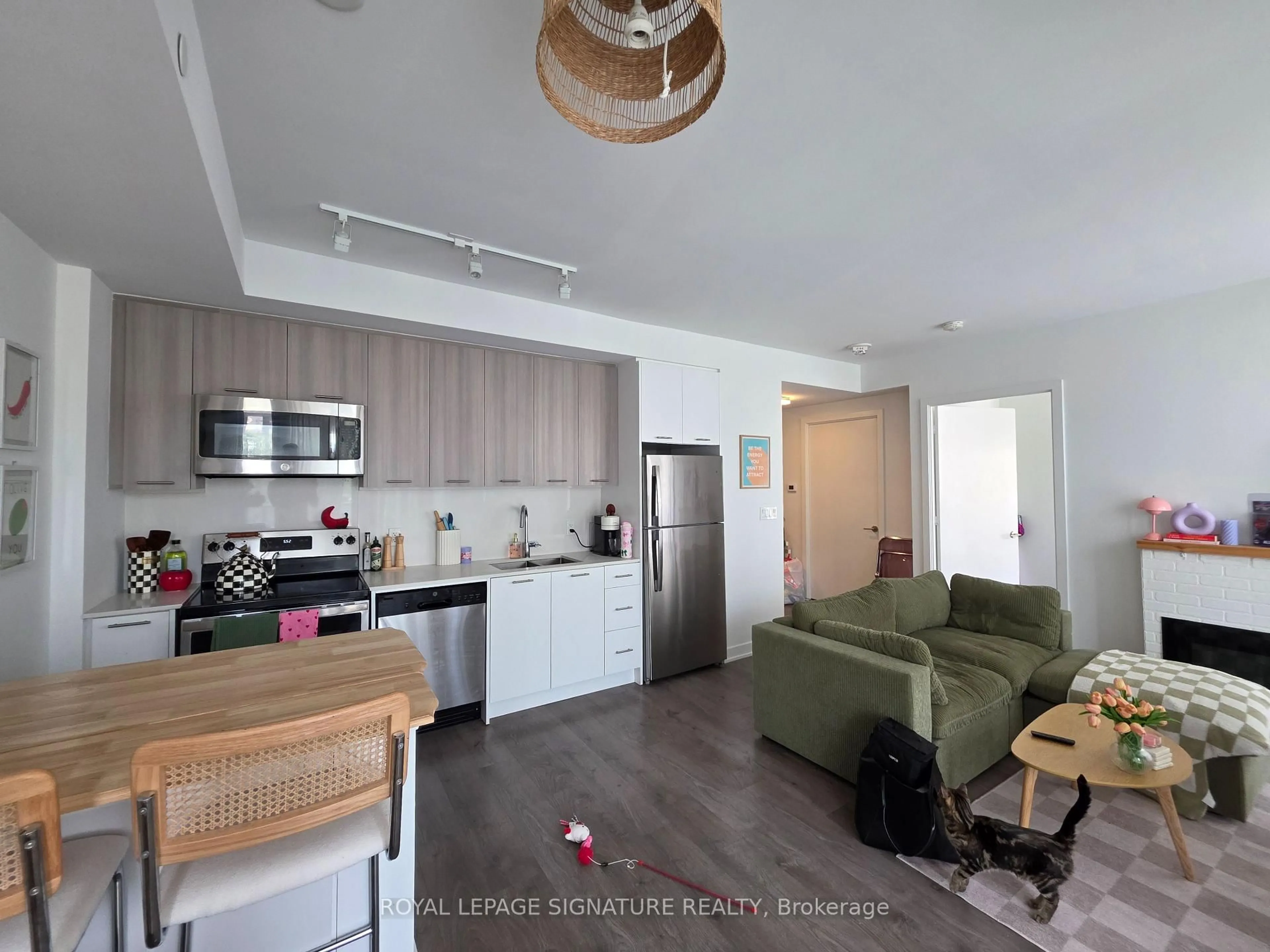 Open concept kitchen, wood/laminate floor for 180 Veterans Dr #210, Brampton Ontario L7A 5G7