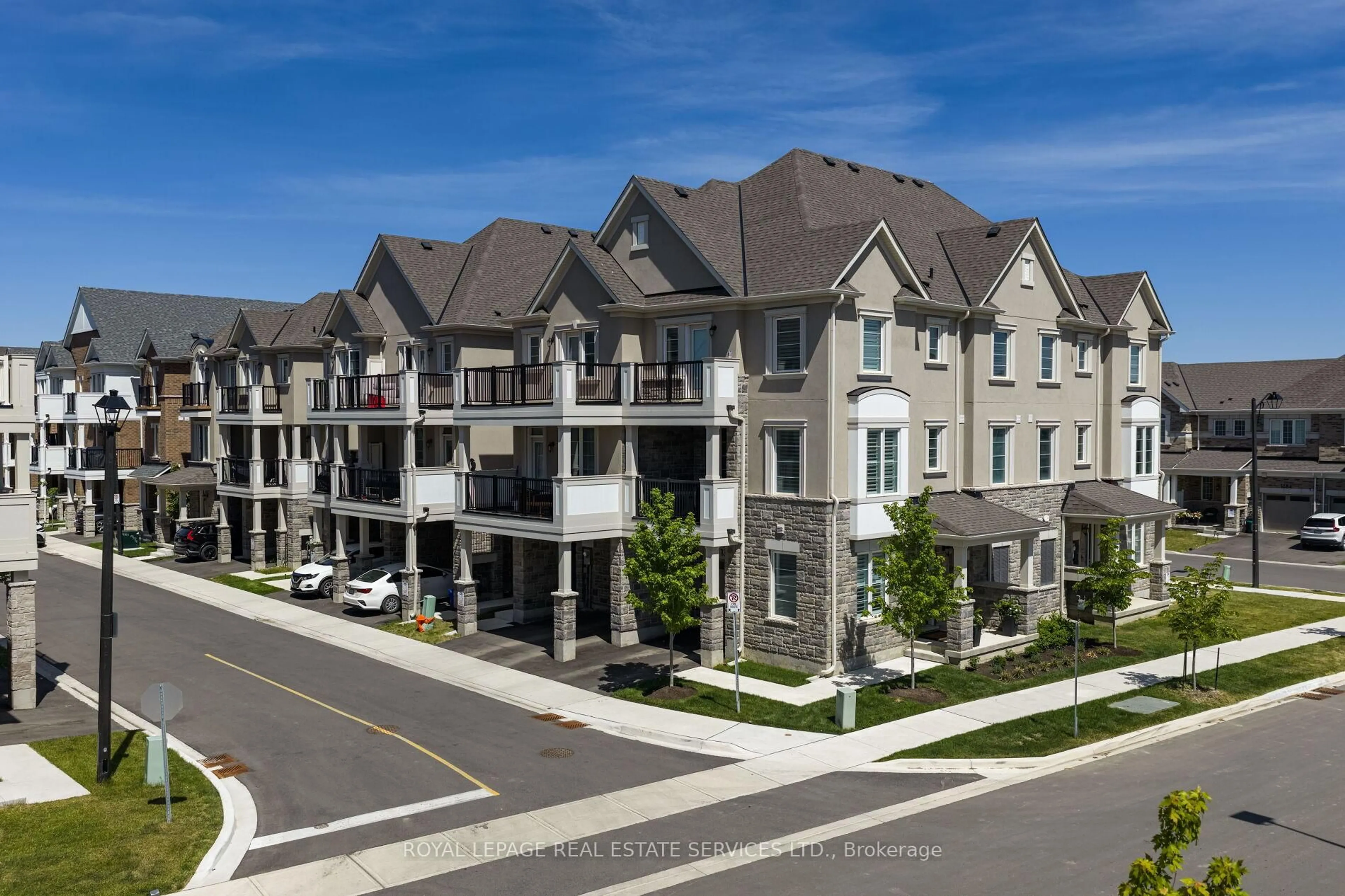 A pic from outside/outdoor area/front of a property/back of a property/a pic from drone, street for 1317 Leriche Way #86, Milton Ontario L9E 0H5