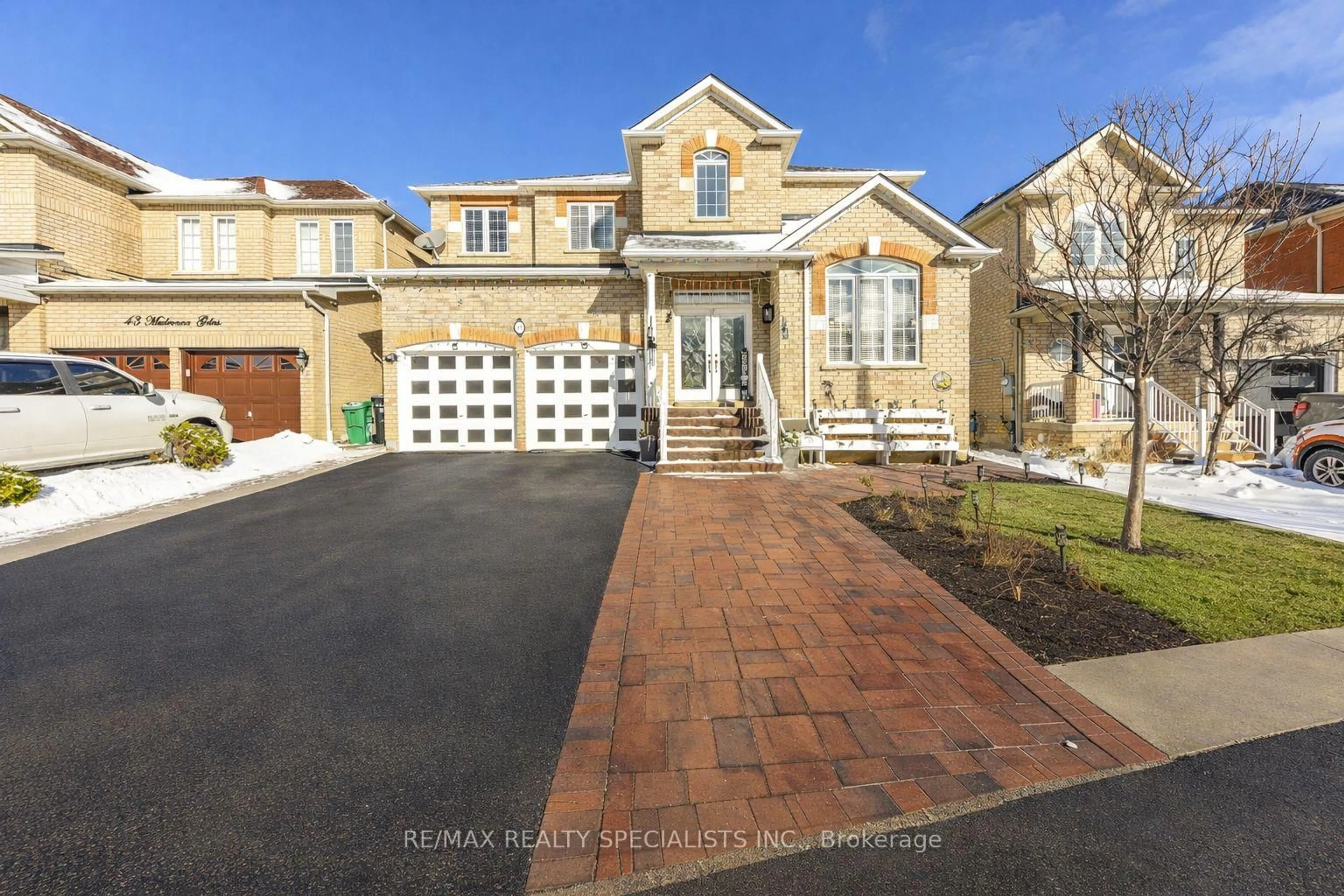 Home with brick exterior material, street for 41 Madronna Gdns, Brampton Ontario L7A 2V9