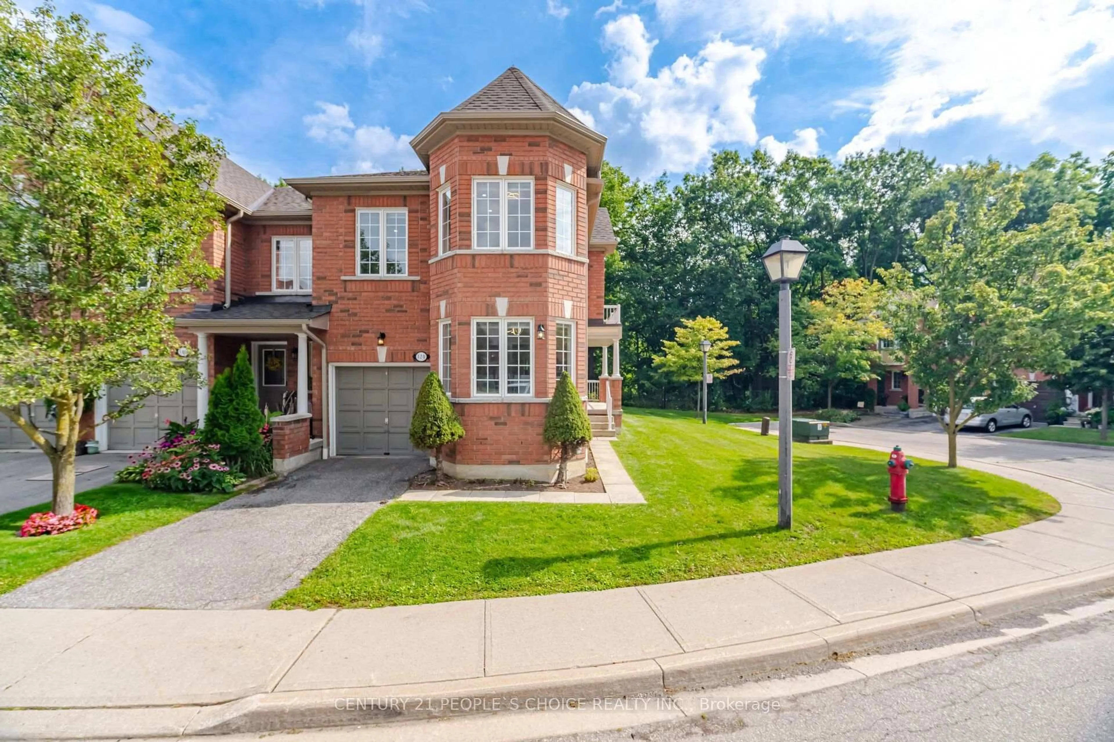 Home with brick exterior material, street for 7360 Zinnia Pl #124, Mississauga Ontario L5W 2A5