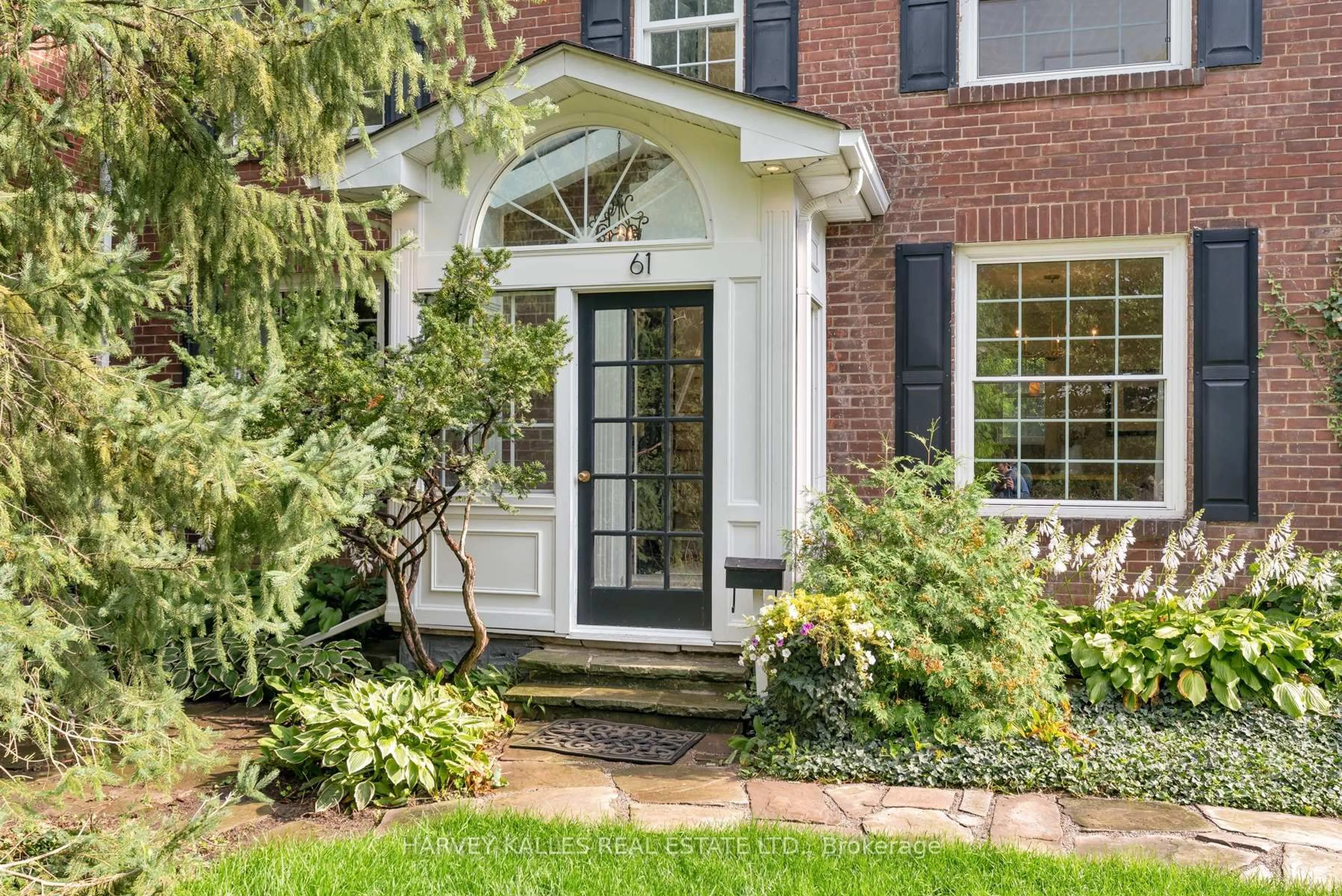 Home with brick exterior material, street for 61 Queens Dr, Toronto Ontario M9N 2H5