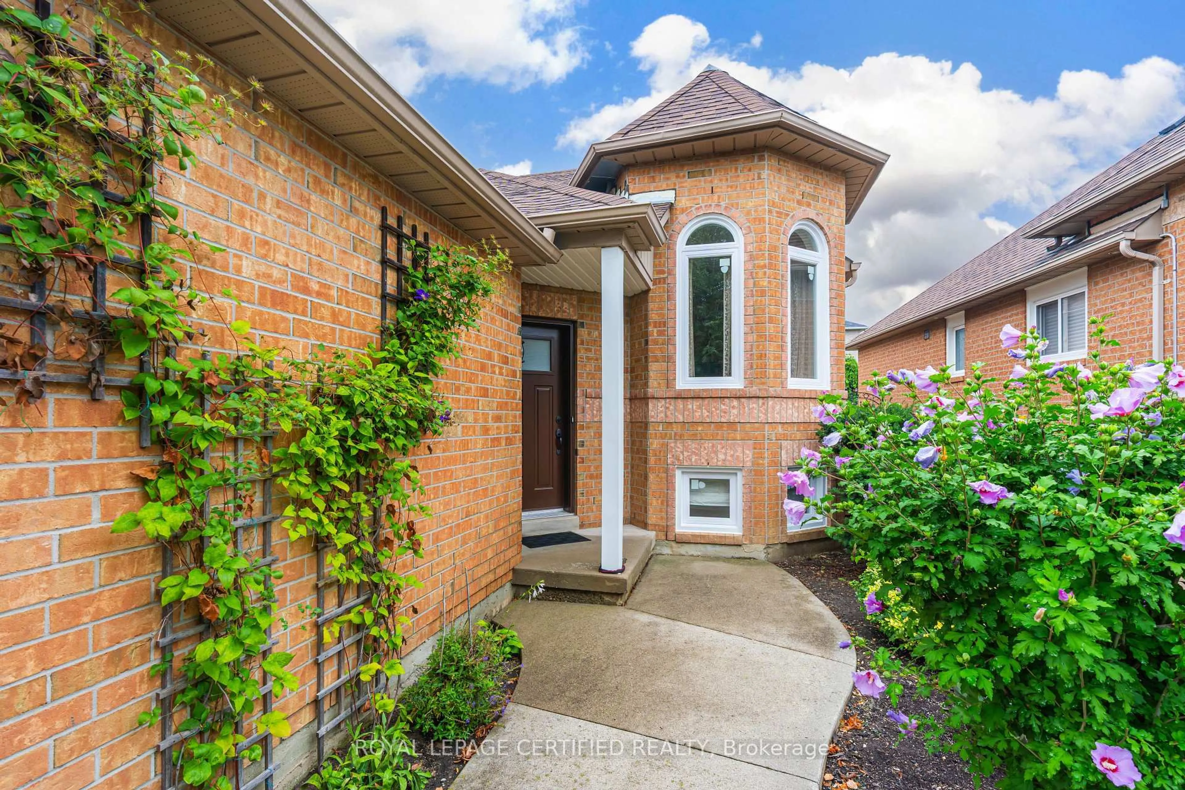 Home with brick exterior material, street for 45 Springview Dr, Brampton Ontario L6X 4M3