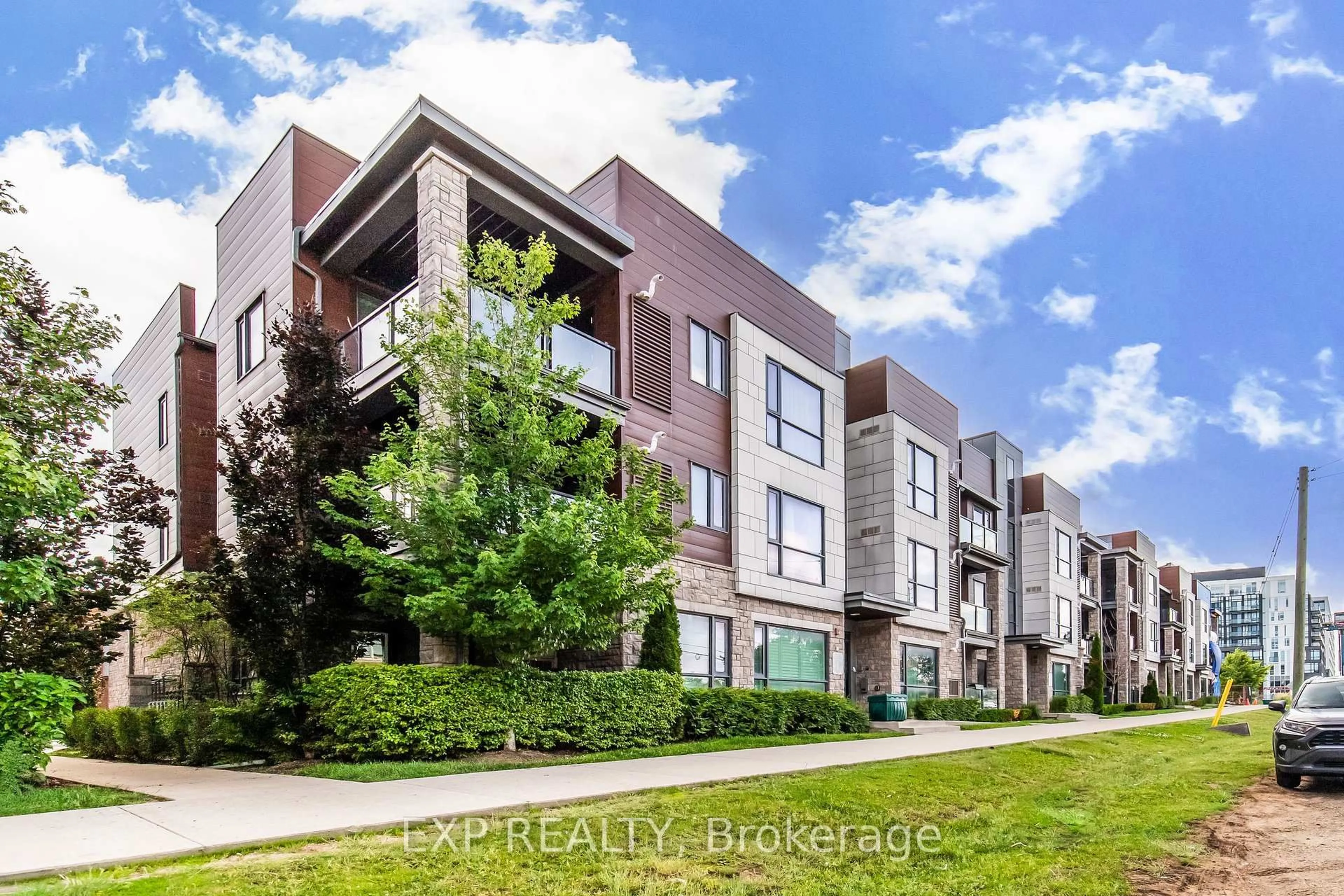 A pic from outside/outdoor area/front of a property/back of a property/a pic from drone, street for 2388 Khalsa Gate #212, Oakville Ontario L6M 1P5